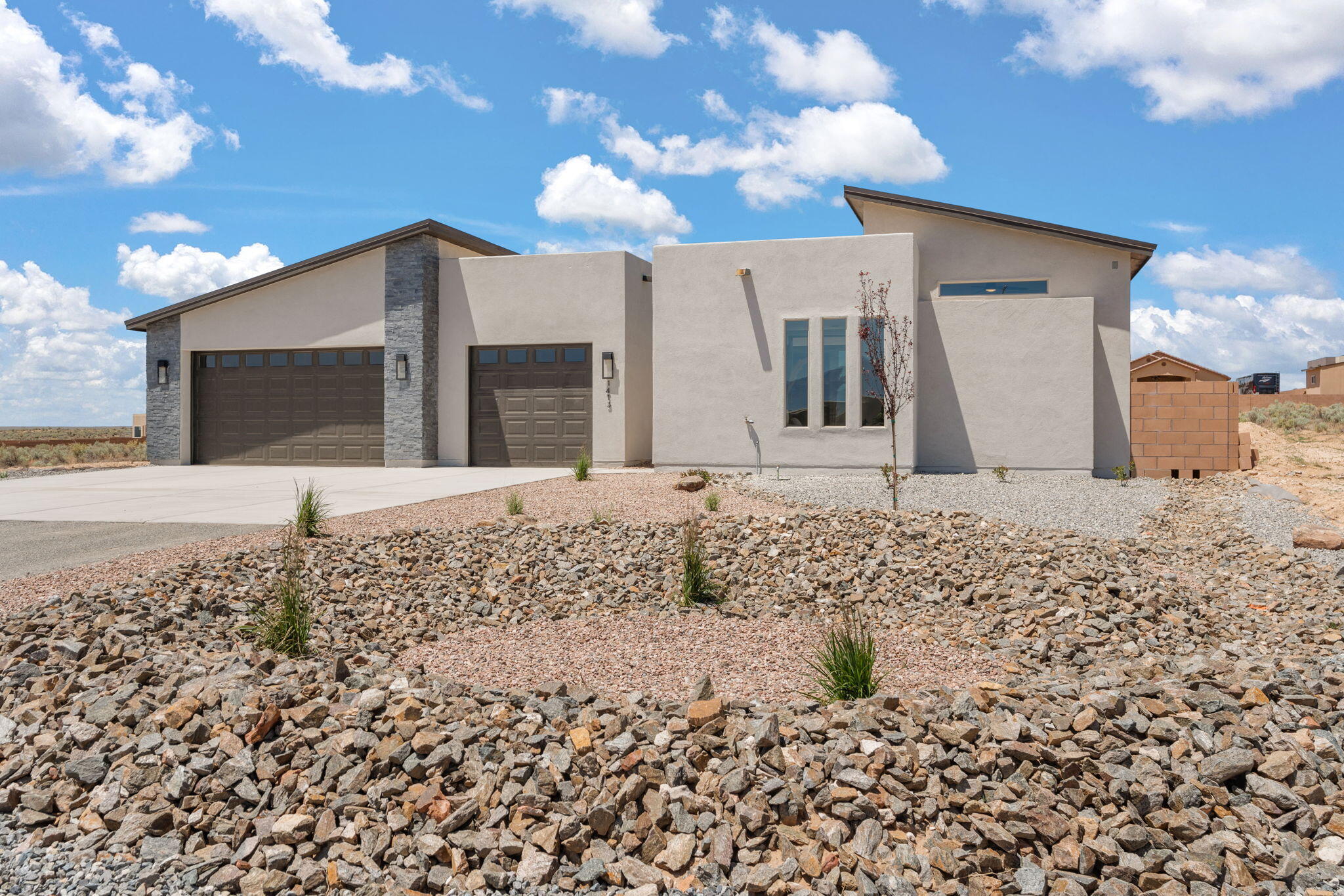 Discover this stunning, modern, newly constructed 3 bedroom plus office residence situated on a 1/2 acre, cul de sac lot in a convenient location near Rust Medical Center, the new market center and many restaurants, breweries and shopping.  The property features two suites which include an In-Law Suite complete with sitting area, kitchenette and large bathroom with walk in shower. The home boasts numerous upgrades, including quartz countertops, laundry room attached to the primary suite, covered patio, a dream kitchen with huge island and double waterfall edges, marble backsplash, built in microwave drawer, modern and abundant cabinetry, undercab lighting, large walk in pantry,  contemporary lighting and  large windows perfect for taking in the spectacular NM sunsets.