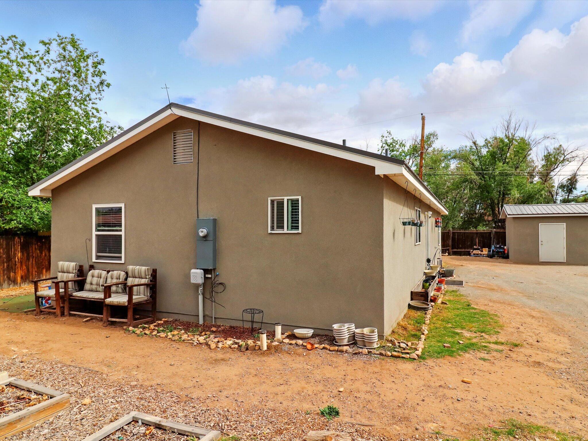 Welcome to your new home! This modern 3-bed, 2-bath home in the North Valley, just 5 years old. This contemporary gem features an open layout, stylish finishes, and a spacious 12x12 shed--perfect for storage or a workshop. Move-in ready and is centrally located. Schedule your showing today!! **Fridge, washer & dryer, microwave, trees, potted plants, tv mounts, small freezer and small cabinet in kitchen will not convey with property.**