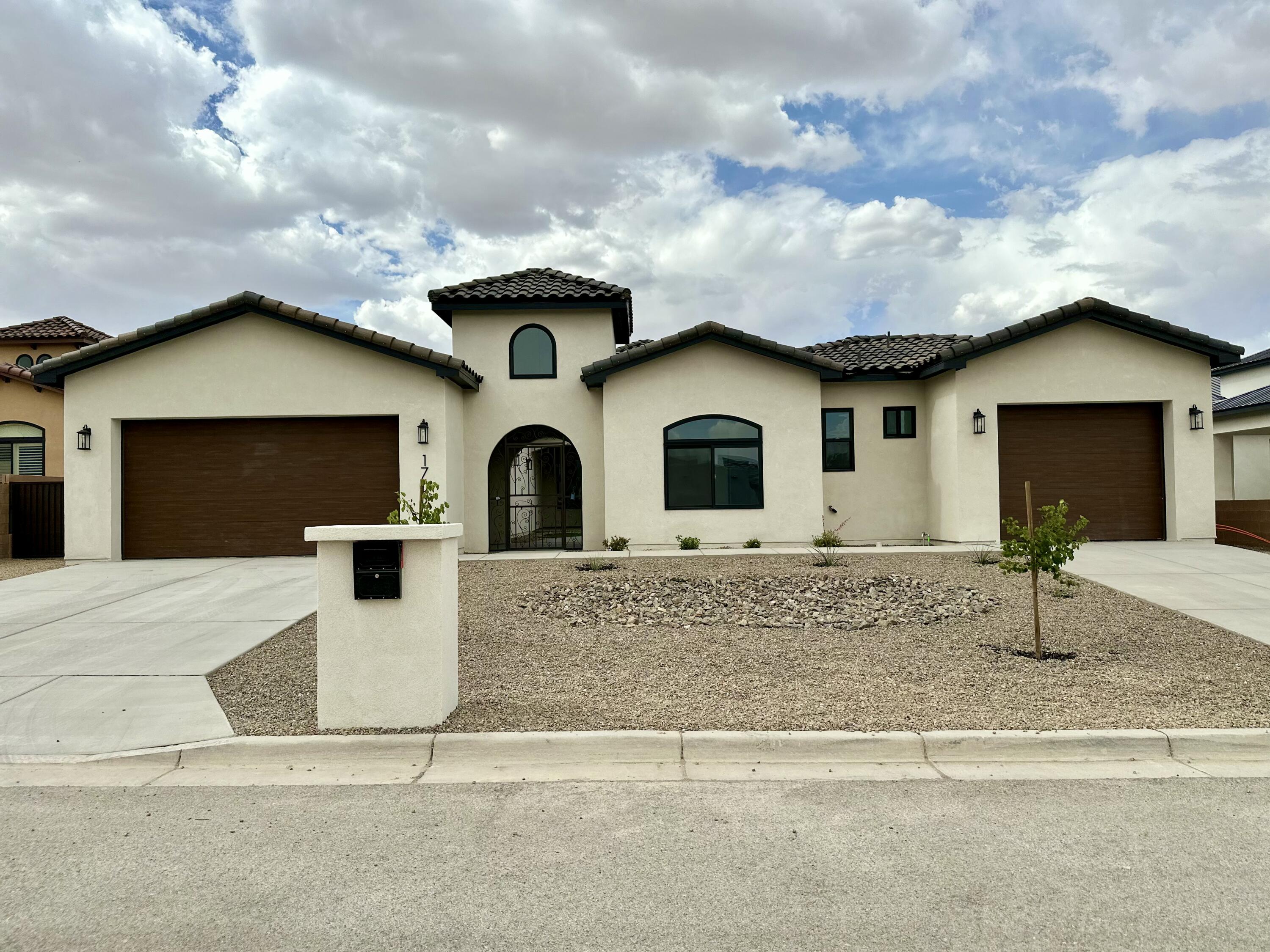 Welcome to your dream home--an exceptional new construction residence that combines refined design with mountain views and high-end amenities. The open floor plan features designer touches throughout, including quartz countertops, custom cabinetry, and rich stone accent walls that add natural texture and warmth. A true entertainer's kitchen flows effortlessly into the living and dining areas, ideal for gatherings of any size.Enjoy outdoor living in the private courtyard or on the patio equipped with a built-in BBQ grill, perfect for entertaining. Inside, a dedicated sports bar provides a great space for relaxing or hosting guests.-Norman Brighton Shutter to be installed.