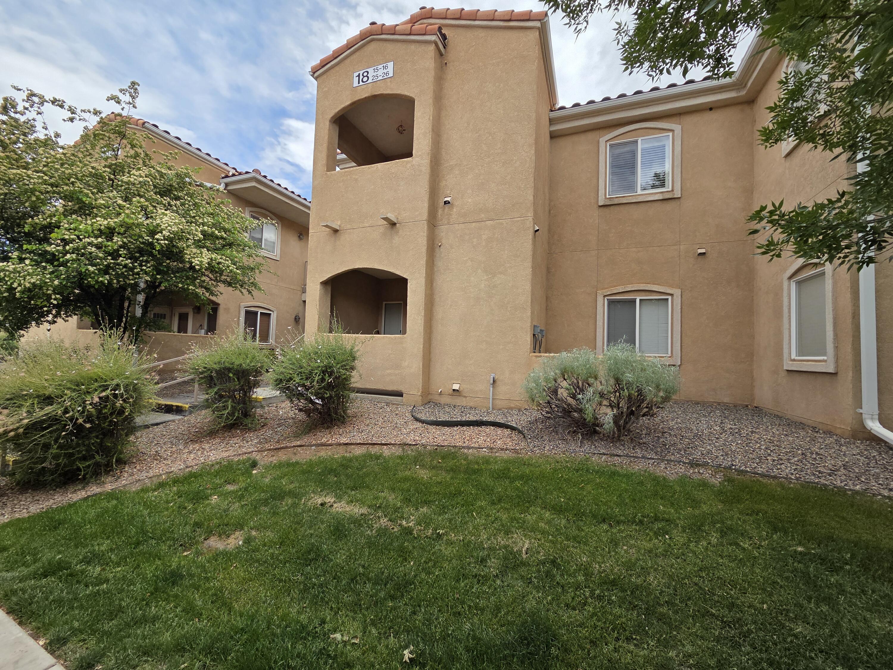 This charming 1 bedroom condo is nestled in the Gated Rancho Mirage community with security on site! 2nd floor unit with stairs.  Great Location quick access to I-25, restaurants, shopping.  Step out onto the covered patio to enjoy stunning views of the Sandia Mountains. The kitchen comes fully equipped with all appliances including  a washer and dryer. Newer Kitchen faucet 2023, Water Heater 2023, Luxury Vinyl plank floors 2023, New Smart thermostat 2023, new smoke/carbon monoxide detectors, Pets are allowed 25 pound limit and long term Rentals ok per HOA.  This Condo also features a detached single-car garage and an additional designated parking space, both conveniently located near the unit and also has 2 Private Pools & Fitness center  on site.