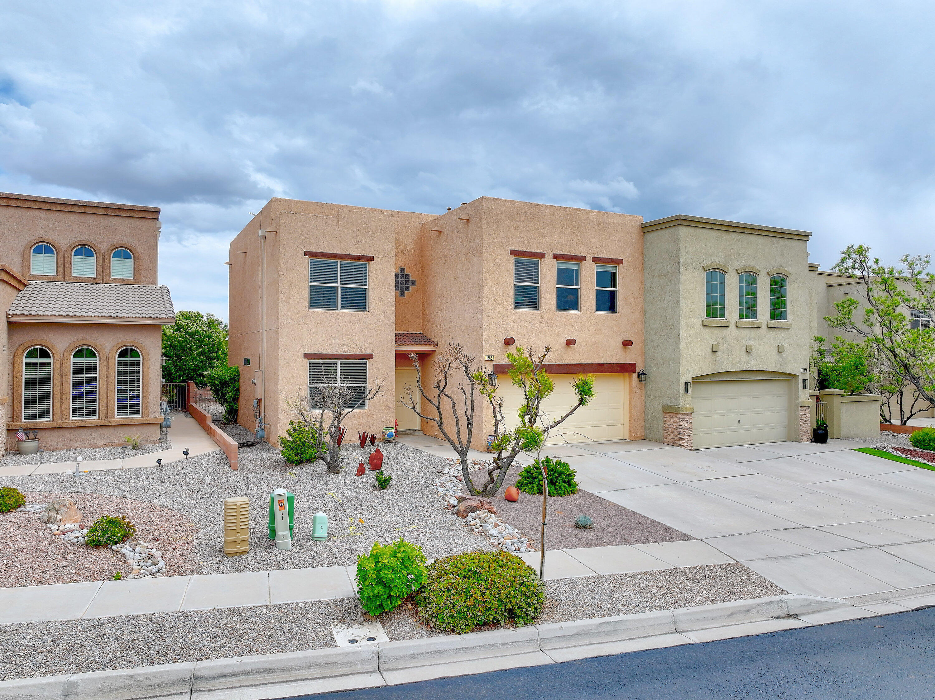 Charming and Spacious Townhome Near Cabezon Park!  Spacious, clean, and inviting, this beautifully maintained townhome offers comfortable living with two generous living areas downstairs and a versatile loft upstairs--perfect for a home office or entertainment space. The expansive primary suite features an oversized walk-in closet and a luxurious bath with dual sinks and a relaxing jetted tub.  Enjoy low-maintenance living with Xeriscaped front and back yards, ideal for outdoor relaxation without the upkeep. Situated just steps from Cabezon Park and the community Swimming Pool, and conveniently close to Shopping, Dining, Entertainment, the new Market Street and Rust Medical Center, this home blends comfort with convenience.  Priced to sell--schedule your private showing today!