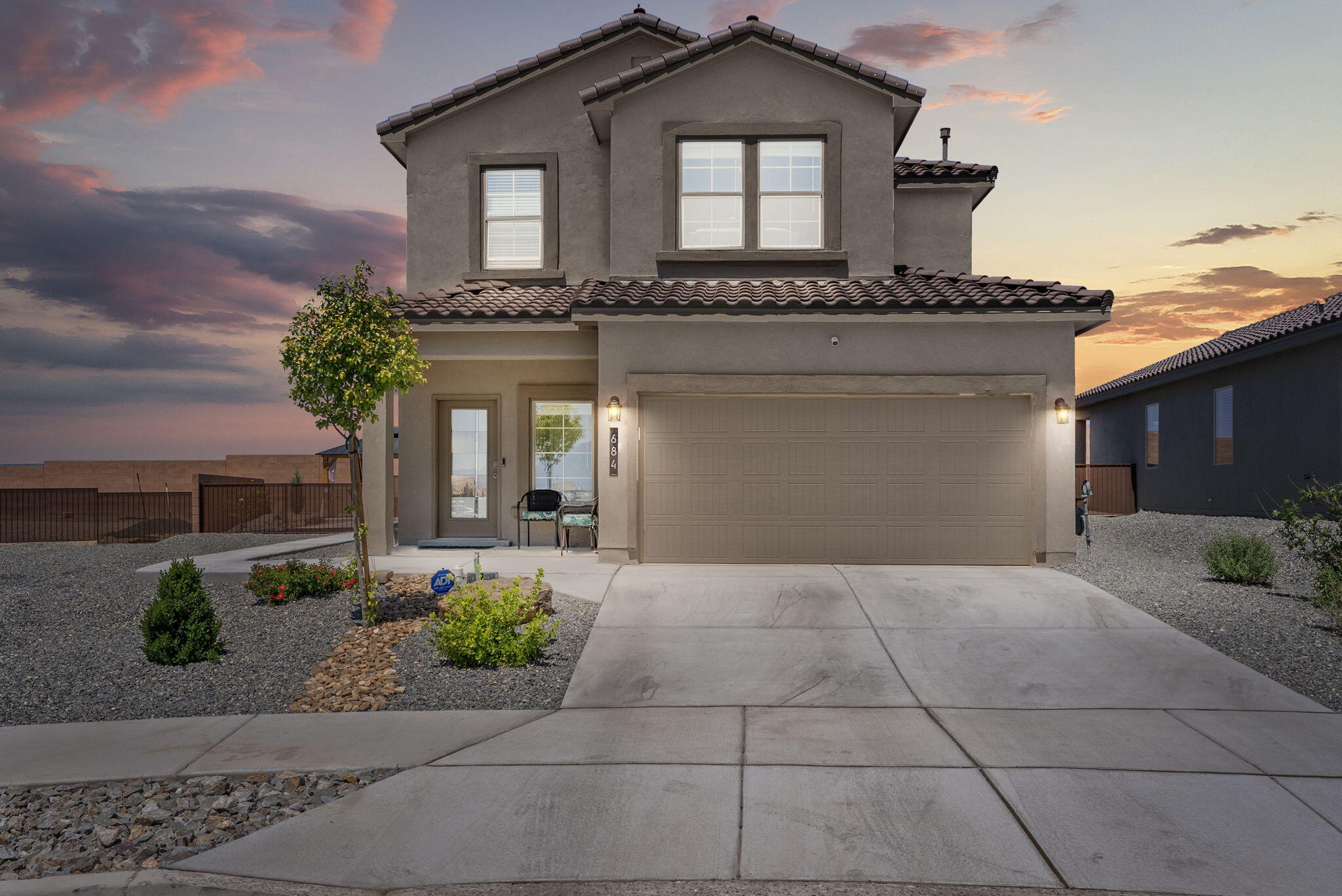 Step into comfort and style with this beautifully maintained, like new, DR Horton home, on a prime corner lot in the desirable Los Diamontes community. Step inside to an inviting open floor plan featuring stylish gray wood-look flooring. The expansive living area flows seamlessly into a gourmet kitchen complete with sleek gray cabinetry, elegant quartz countertops, a chic tile backsplash, and stainless steel appliances including a gas range, microwave, and dishwasher. A large center island with seating makes it ideal for casual dining and entertaining. First-floor owner's suite, with en-suite with dual sinks, a glass-enclosed walk-in shower, and a generous walk-in closet. Upstair loft makes a great home office. Landscaped yard with side yard access and a covered pergola!