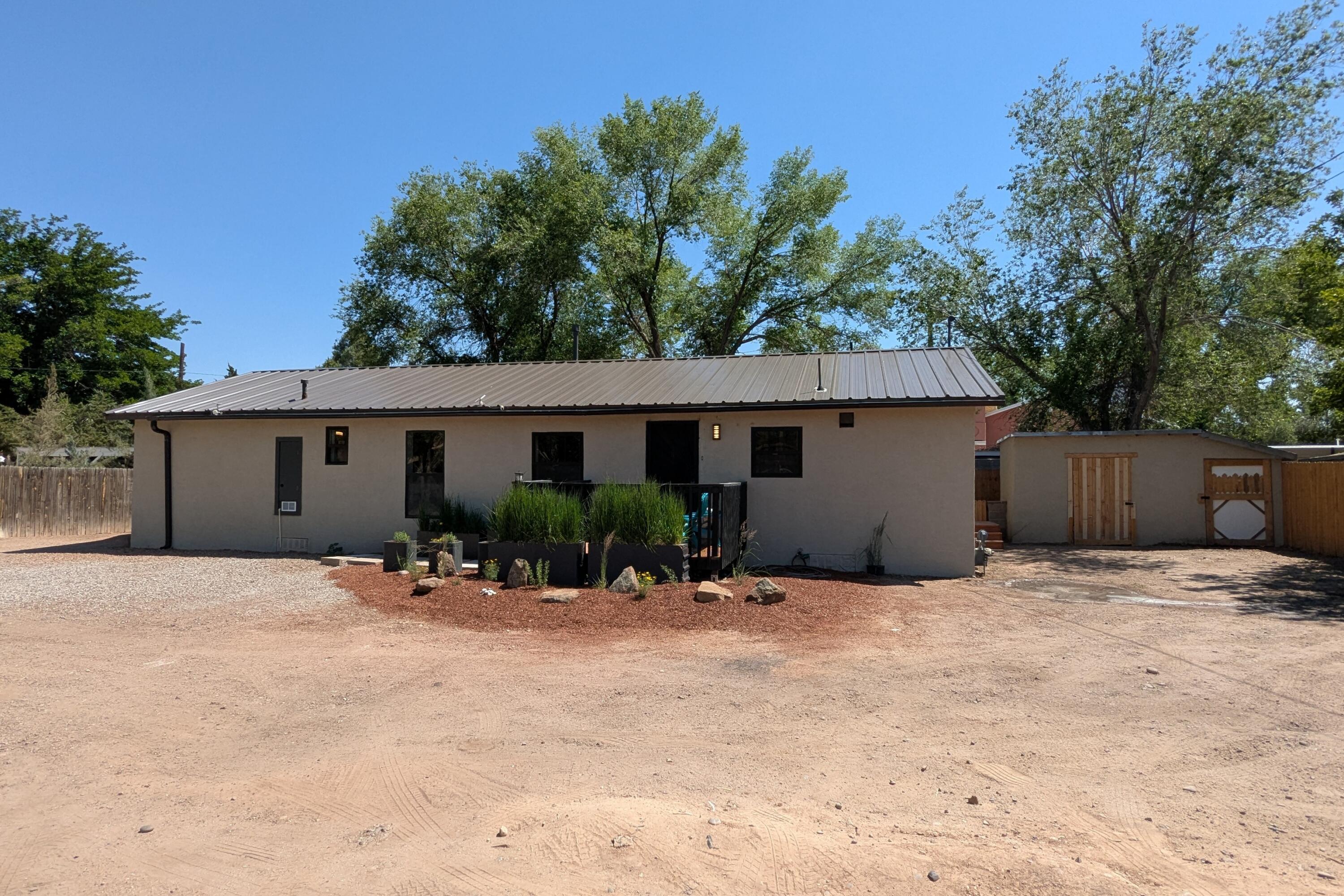 Cute, quiet, secluded north valley home.  Close to the Rio Grande and Bachechi open space and the Bosque trail. Newly updated 3 bedroom 1 3/4 bath. Metal roof, forced air furnace and refrigerated air. Newer Pex piping. Huge walk-in master closet and walk-in tile surround shower.