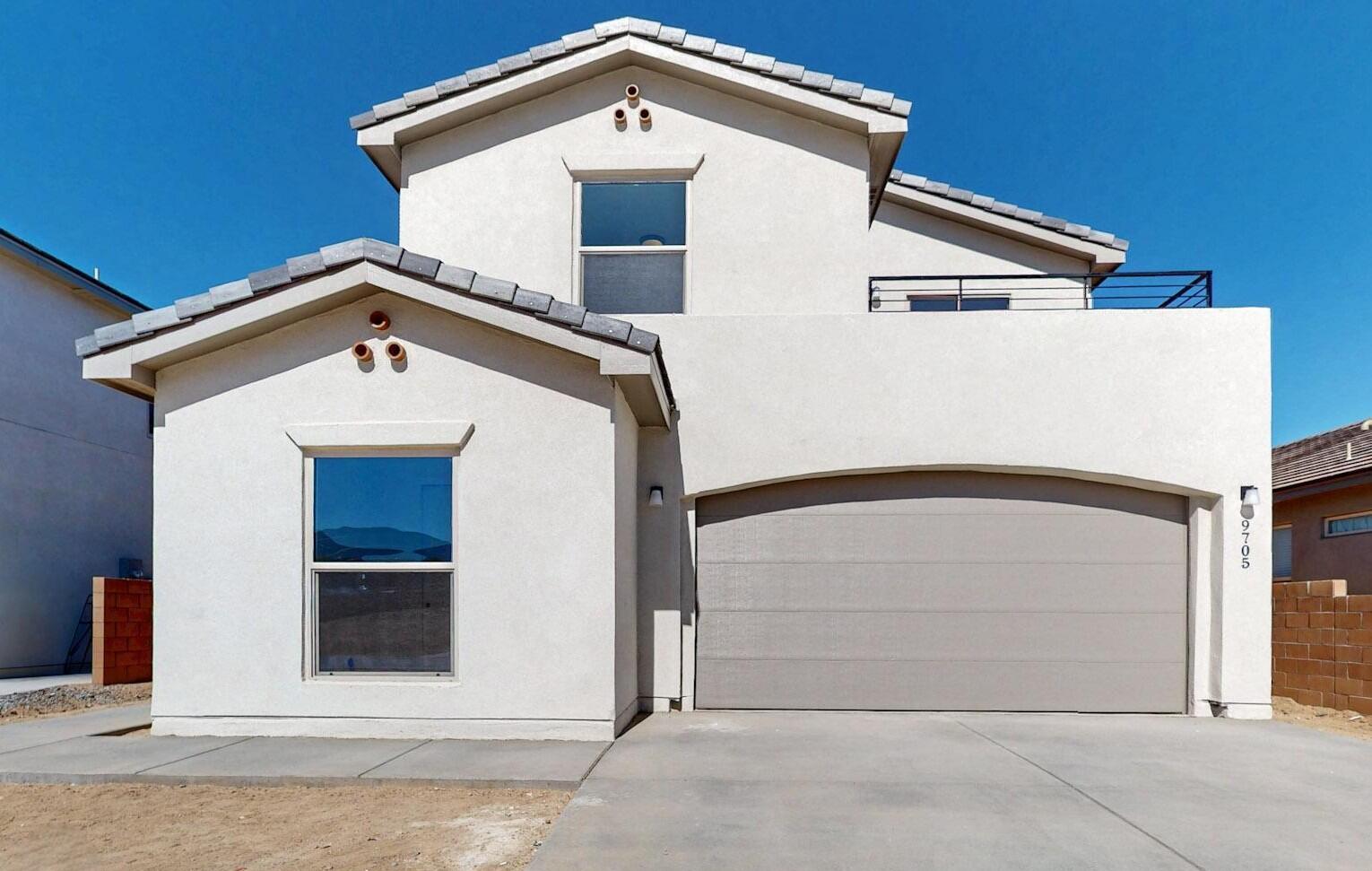 In the highly sought-after Palomas Meadows, this stunning new Stillbrooke Home is one of the last opportunities to own in this coveted community. Designed with functionality in mind, the home boasts five spacious bedrooms, three well-appointed bathrooms, and a versatile loft. The heart of the home, the beautifully designed kitchen, combines modern elegance with practical functionality. Warm grey shaker cabinets provide a timeless look, perfectly complemented by sleek white cultured marble countertops. A spacious island offers ample prep space and seating, making it ideal for gatherings. Matte black hardware adds a bold, sophisticated touch, while the large pantry ensures plenty of storage for all your kitchen essentials. The powder bath offers a touch of luxury.
