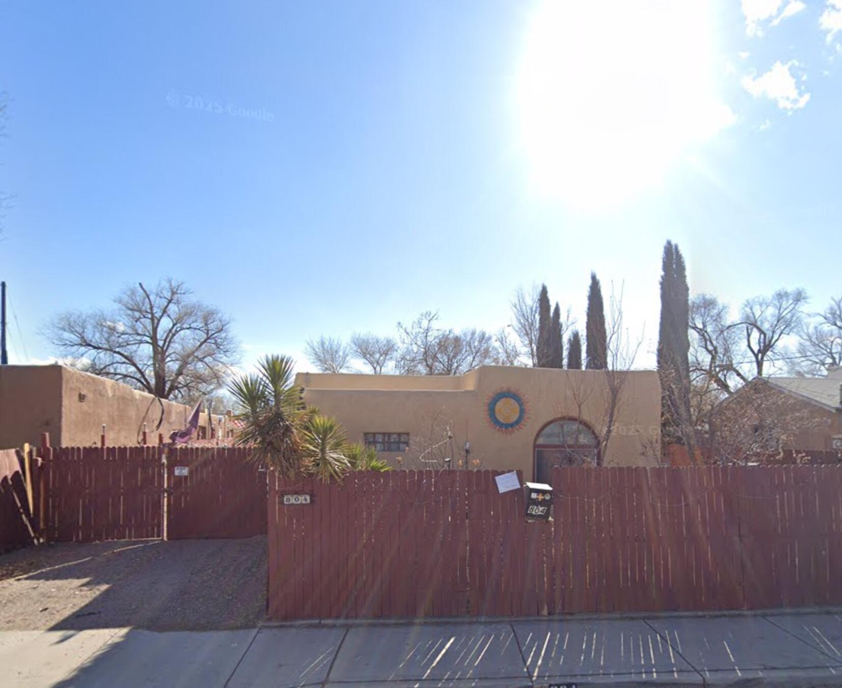 Enjoy the sweet comfort of Albuquerque's South Valley.  Thoughtfully maintained home with improved stucco, roof, electrical upgrades, numerous fruiting trees and an outdoor hot tub. The uniquely designed dog kennel/run allow your furry friend dual access to the home + outdoor space. There is even a detached building for your overnight guests. Did mention there are 2 laundry rooms? This is a must see.