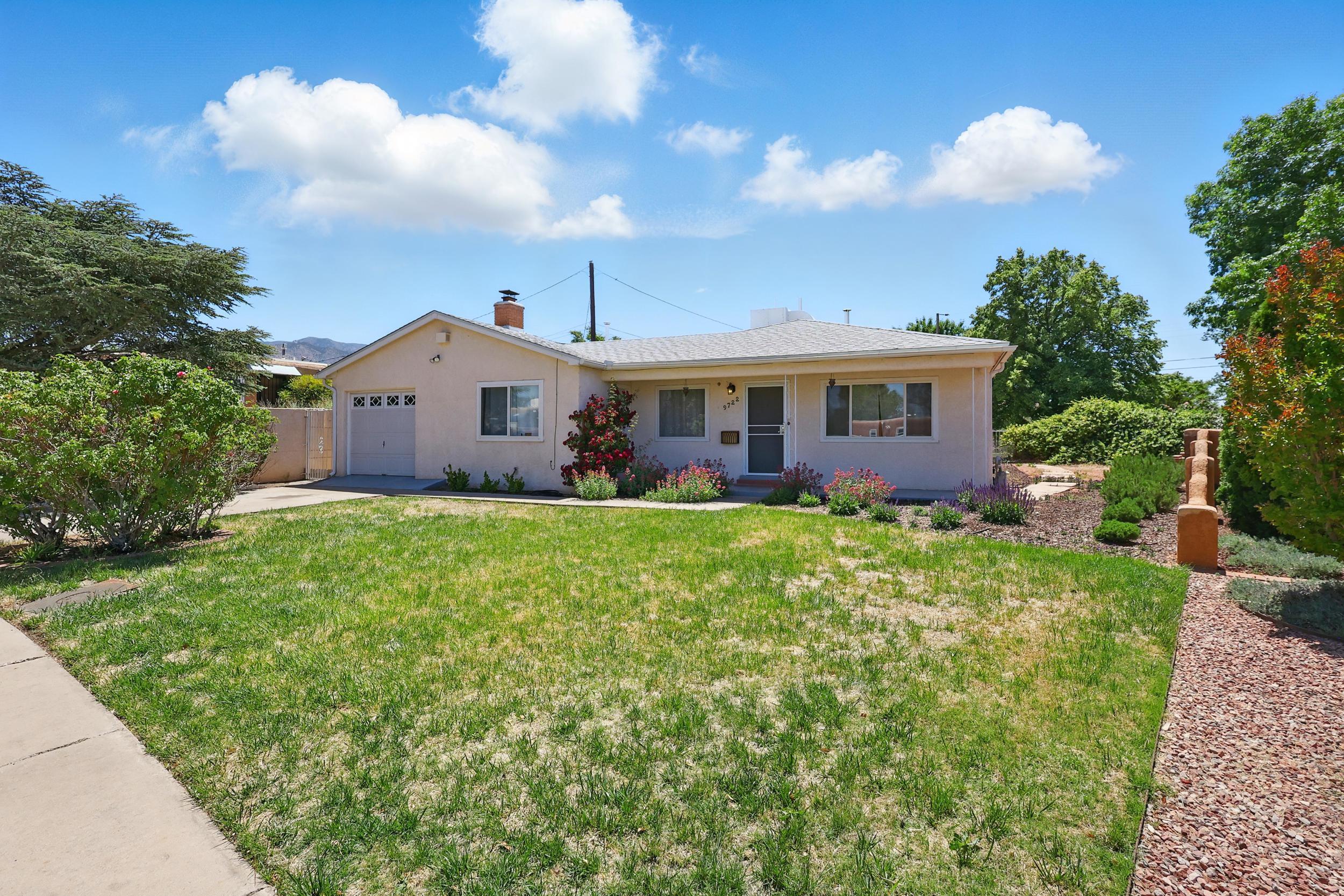 Big yard, great vibes-Come home to a huge lot with backyard access and loving updates throughout.This solid 3 bed, 2 bath home was built to last and sits on a roomy quarter-acre lot in the well-loved Snow Heights neighborhood. The yard is a dream--packed with features that thousands of dollars couldn't recreate. Big, green, and full of life with mature trees for shade, fruit trees, blooming roses, and colorful perennials. There's plenty of space for entertainin, garden projects, or just hanging out and enjoying the sunshine. Whether you're hosting a BBQ or planting your first veggie patch, this yard's got you covered. Inside, you'll find charm and sturdiness, and a bonus living space with a wood burning fireplace, ready for frosty evenings and your personal touch.