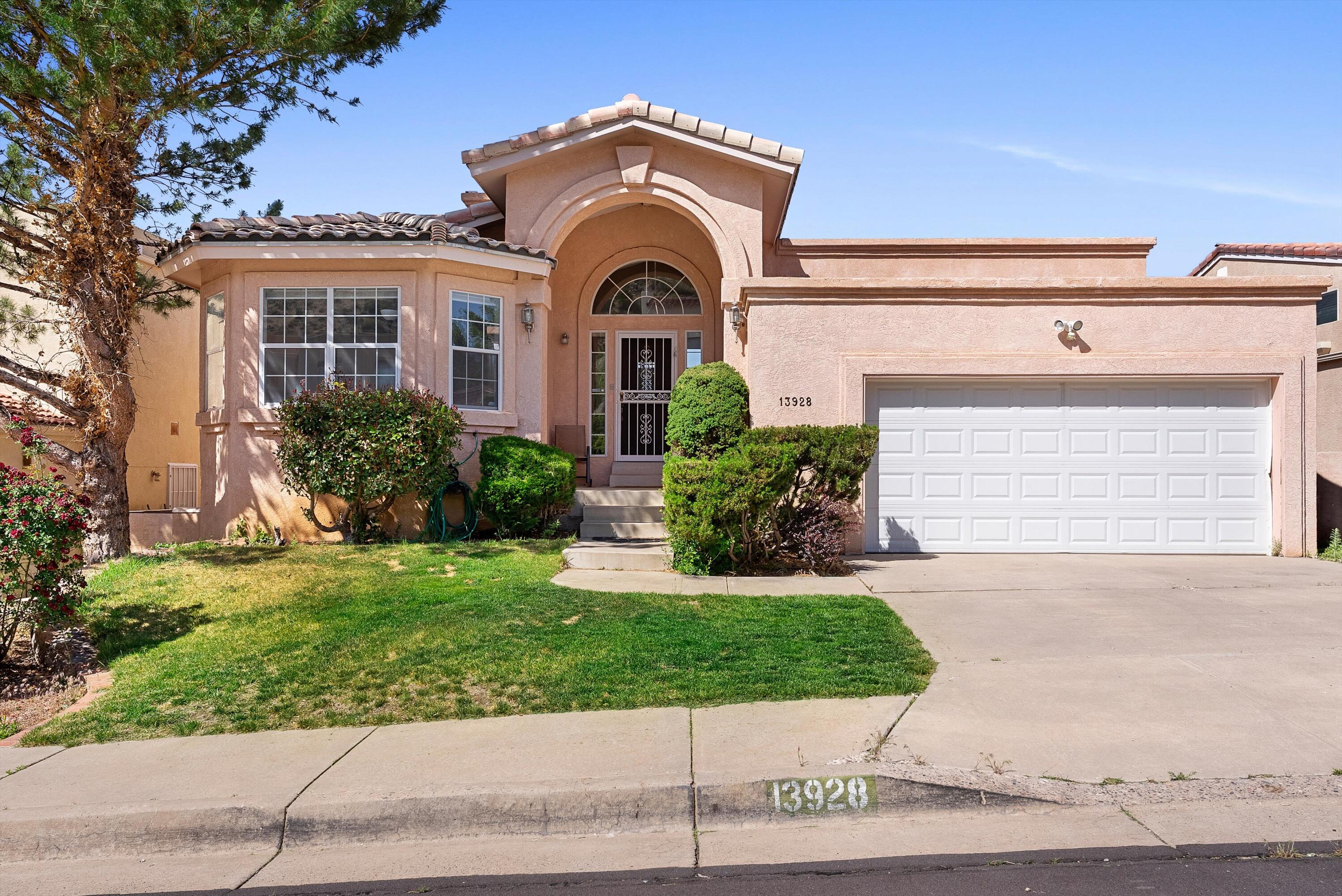 Discover this stunning custom Eric Spurlock home nestled in the desirable Albuquerque Foothills.  Featuring 4 bedrooms and three baths, this thoughtfully designed residence offers a luxurious main-level primary suite complete with a cozy fireplace, jetted tub, expansive walk-in closet, and a private walkout balcony--perfect for soaking in breathtaking views.The lower level with it's own private entry boasts an additional bedroom and bathroom along with over 1,200 square feet of flexible space. Whether you envision extra bedrooms, a home office, or the ultimate man cave, this area adapts to your lifestyle needs.