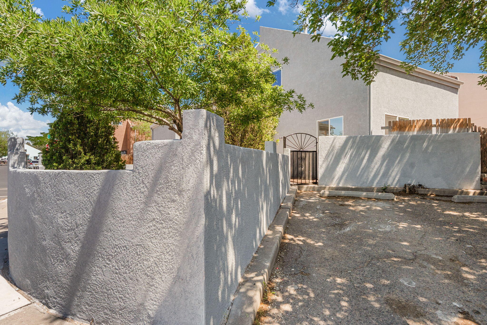 Fantastic renovated home is ready for its new owners--and you won't want to miss it! Located just down the road from CNM, UNM stadiums, & Isotopes Park, this home is in a prime spot for students, young professionals, or savvy investors looking for a solid rental opportunity. Property Highlights: 3 Beds, 2 Baths, 2 living areas, & a beautifully updated living space. Refrigerated Air. Priced at just $300K - an unbeatable value for this area and condition! New shingle roof, new windows, Fresh stucco patch & paint, Fully updated kitchen with new cabinets & appliances, New flooring, interior paint, lighting, and fully remodeled bathrooms, fresh landscaping in front and back! Come see this home today!