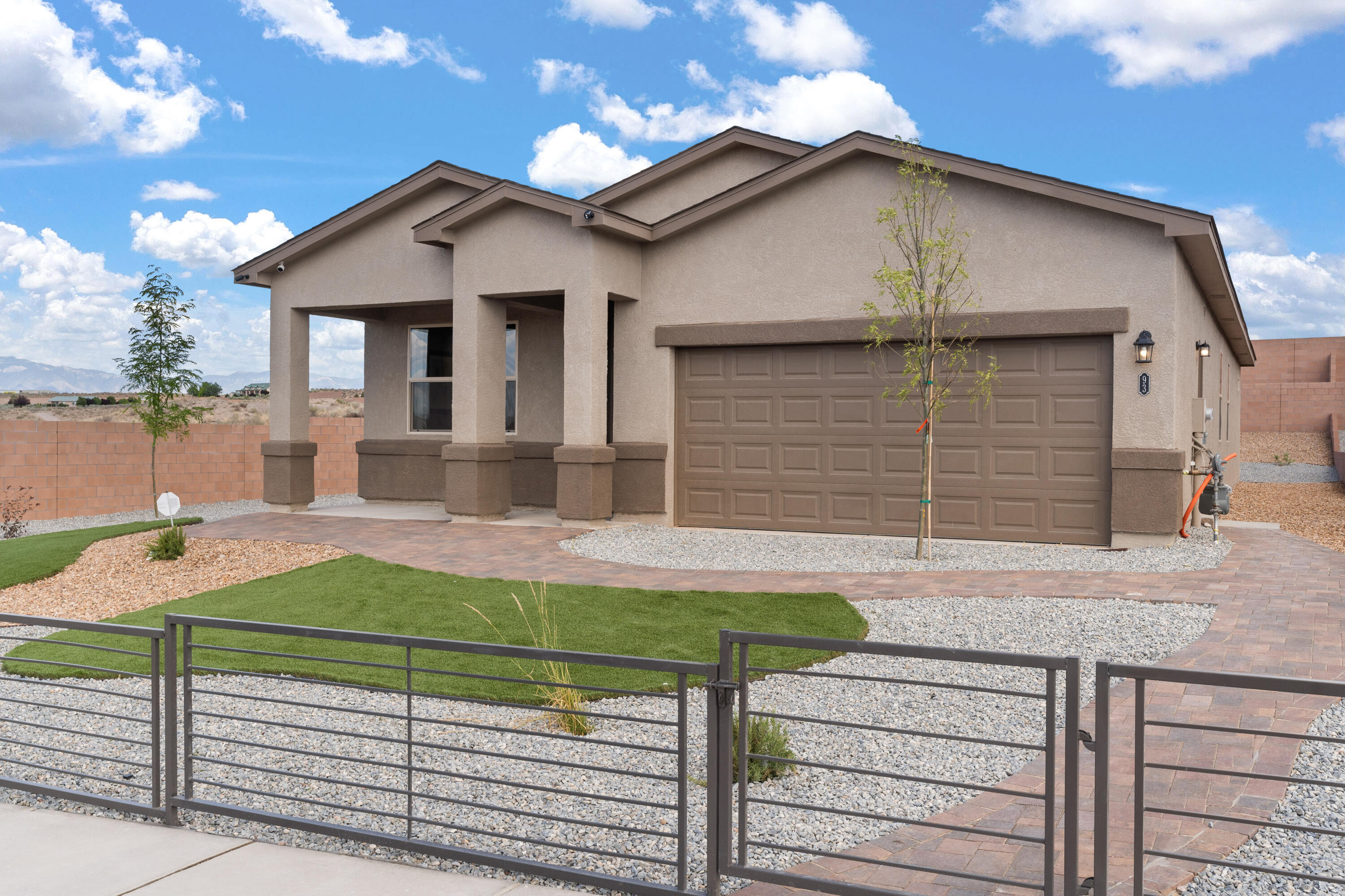 This 1,716 sq ft home offers an open-concept layout with 3 bedrooms and 2 baths. The kitchen features Whirlpool stainless steel appliances, including a microwave, range, and dishwasher. Enjoy a spacious primary bedroom, a covered patio for outdoor living, and a smart home system for added convenience. Stylish, functional, and move-in ready! Modern design, smart features, and plenty of room to live and grow--this home has it all!