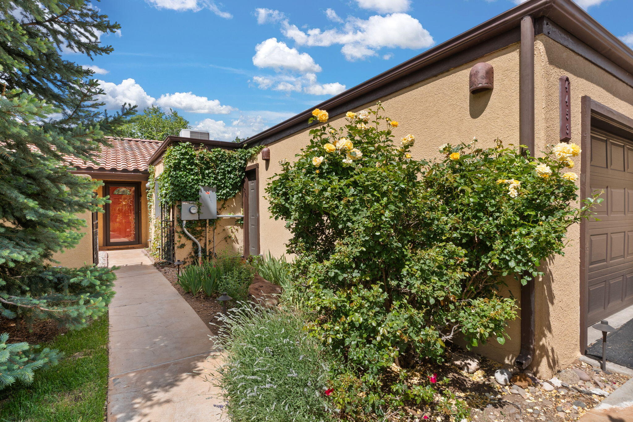 You do not want to miss out on the Glenwood Hills home! This charming single story, 3 bed, 2 bath property also features 2 fireplaces, 2 living areas, & 2 car garage. Refrigerated air & central forced air heating. No carpet! Enjoy the beautifully landscaped front & back patios w/ mountain views, turf, and beautiful mature flowers & trees! Nestled in the highly desirable foothills & close to shopping, restaurants, & more! New roof & water heater! HOA covers water, Sewer, and trash. Don't miss your chance to live in one of the most sought-after areas--schedule your private tour today!