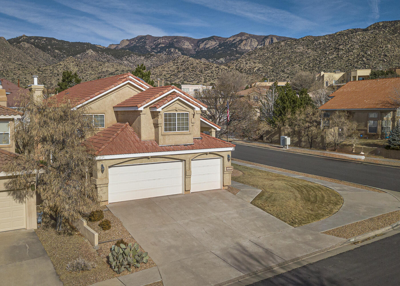 Stunning 5-Bedroom Home in the Sandia Foothills This beautifully maintained 5-bedroom, 3-bathroom home sits on a 6,534 sq. ft. corner lot in the serene Sandia Foothills. With 2,630 sq. ft. of living space, it blends comfort and functionality. Luxury vinyl flooring runs throughout the downstairs, where a spacious kitchen with a breakfast nook opens to a cozy living room with a gas fireplace. A formal dining room offers an elegant space for entertaining. The first-floor bedroom and 3/4 bath provide convenience for guests or multi-generational living. Upstairs, brand-new plush carpet adds warmth to the generously sized bedrooms. The primary suite features a soaking tub, dual sinks, and a walk-in closet.The peaceful backyard boasts a tranquil pond, perfect for unwinding. Located near hiking tra