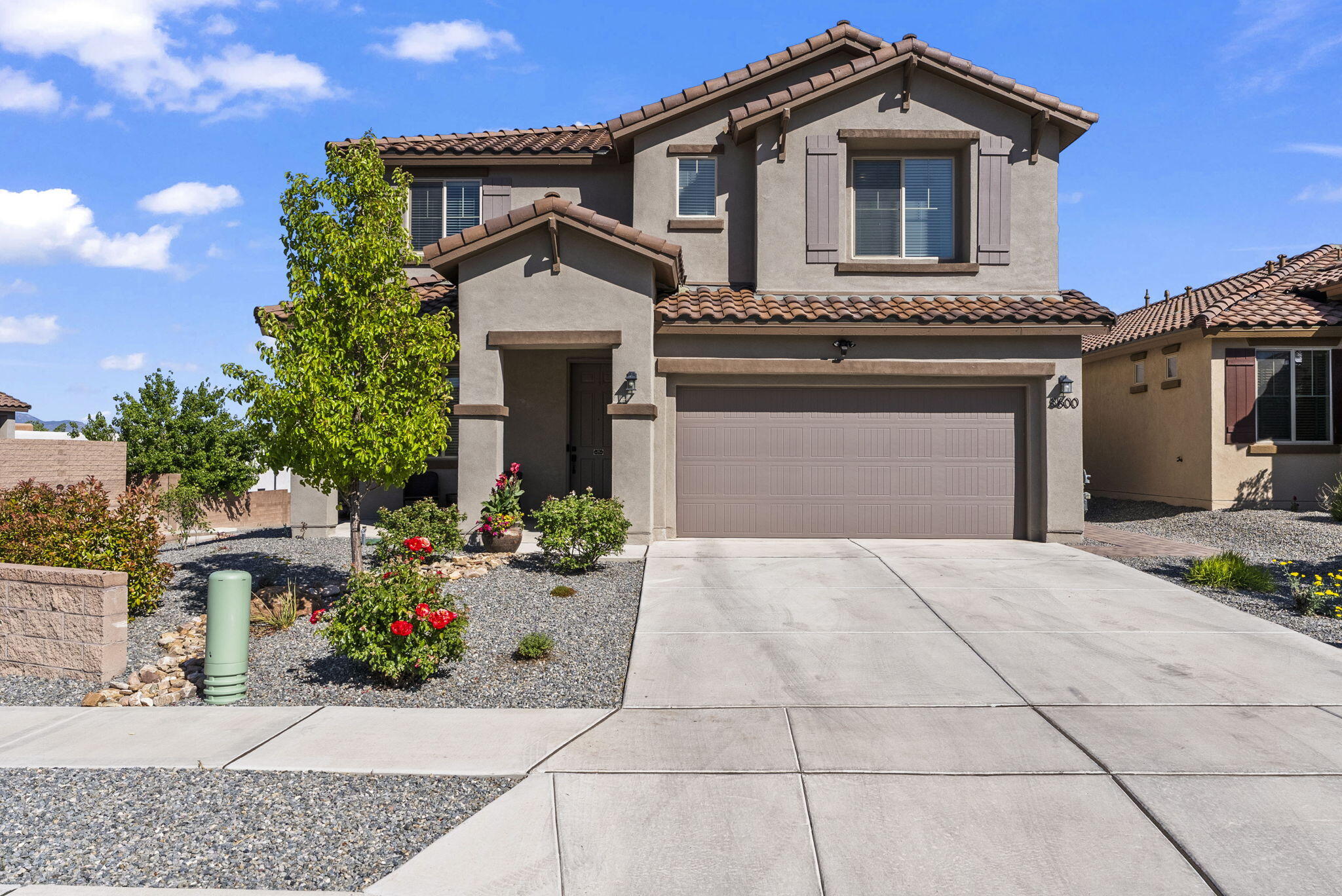 Welcome to this spacious and well-maintained 4-bedroom, 3-bathroom home located on a corner lot in Northwest Albuquerque. The thoughtfully designed floor plan features a primary suite on the main level, offering privacy and convenience with a large walk-in closet, dual sinks, soaking tub, and separate shower. Upstairs, you'll find three additional bedrooms, a full bath, a versatile loft, and a dedicated office room--perfect for remote work, study, or creative space. The main floor also includes two living areas, a formal dining space, and a bright kitchen with ample cabinetry and a cozy breakfast nook.Step outside to enjoy the private backyard with a covered patio, ideal for entertaining or relaxing. Located close to parks, schools, and shopping, with easy access to I-40, this home combine