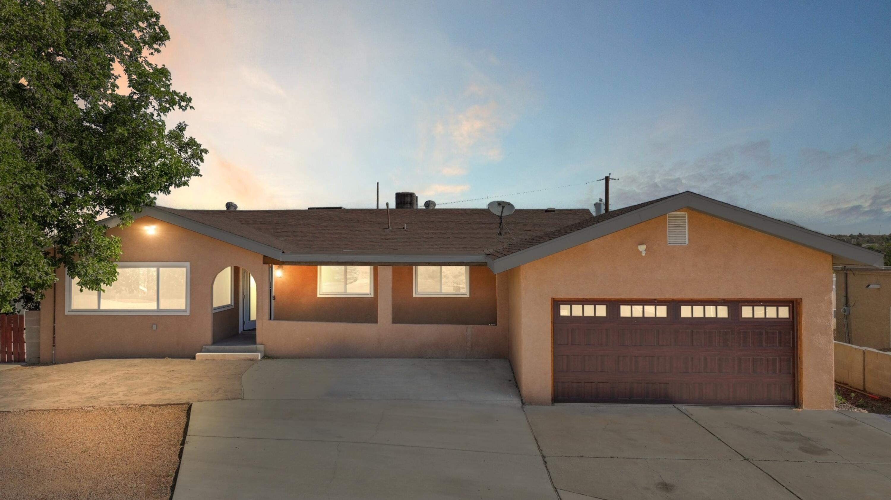 Pre-inspected and priced under appraised value! Incredible opportunity in a prime Westside location near Paseo and Coors, close to top-rated schools, shopping, and dining. This spacious home sits on a large, step-down lot and features open living areas, a gourmet kitchen with granite counters, high-end appliances, and updated cabinets. Main level includes 3 bed, 2 bath, a central living space, and a primary bedroom. Downstairs offers a second private primary suite with backyard access, custom shower, dual vanities, and walk-in closet. A large bonus room can serve as a theater, game room, or 5th bedroom--perfect for multigenerational living. Huge yard with patio, dog run, shed, and backyard access. Thoughtful upgrades throughout!