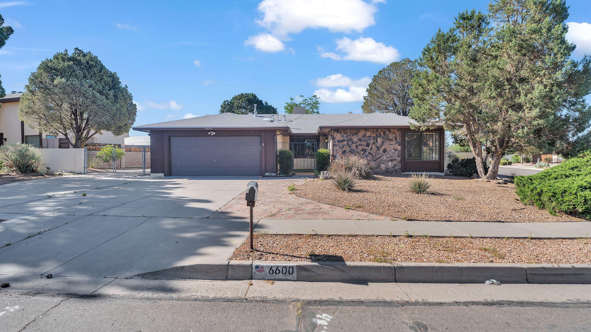 Located on the NE side of town, this spacious 4 bed, 2 bath home offers comfort, functionality, and charm. Enjoy peace of mind with security bars throughout, and relax by the cozy fireplace in the living area. The kitchen features beautiful granite countertops, perfect for cooking and entertaining. Backyard access adds extra convenience for outdoor living or future expansion. Don't miss this opportunity to make it yours.