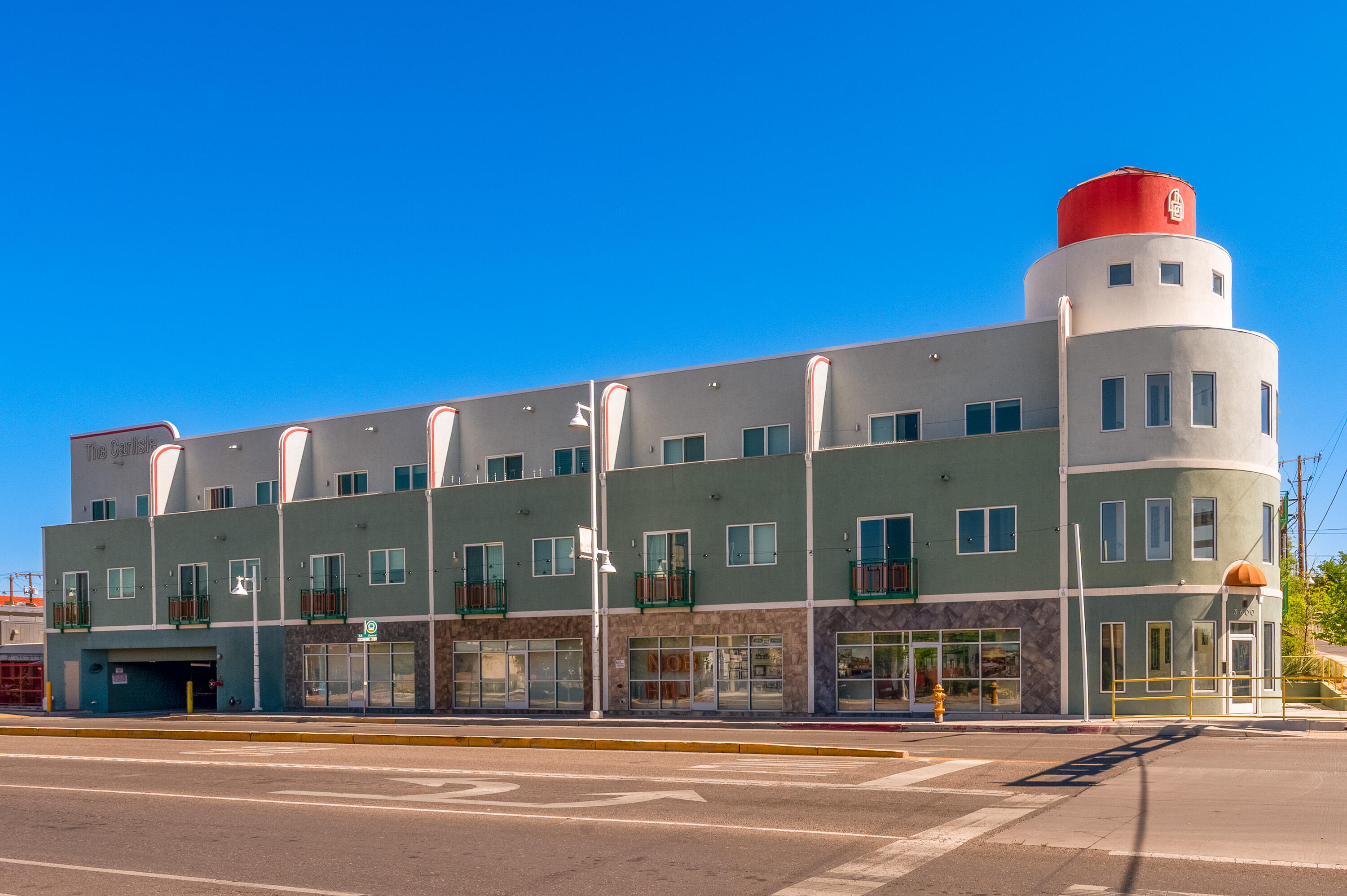 Incredible condo in the heart of Nob Hill, just steps from Albuquerque's top restaurants, breweries, and nightlife. Close to UNM, downtown, hospitals, and courthouses. Located in an award-winning building with striking architecture, this unit features a bright, open floor plan with wood floors, white shaker cabinets, quartz countertops, stainless appliances, and in-unit washer/dryer. Enjoy secure underground parking, a lush interior courtyard with water feature, and a rooftop deck with stunning views of the Sandia Mountains and city lights. Urban living at its finest!