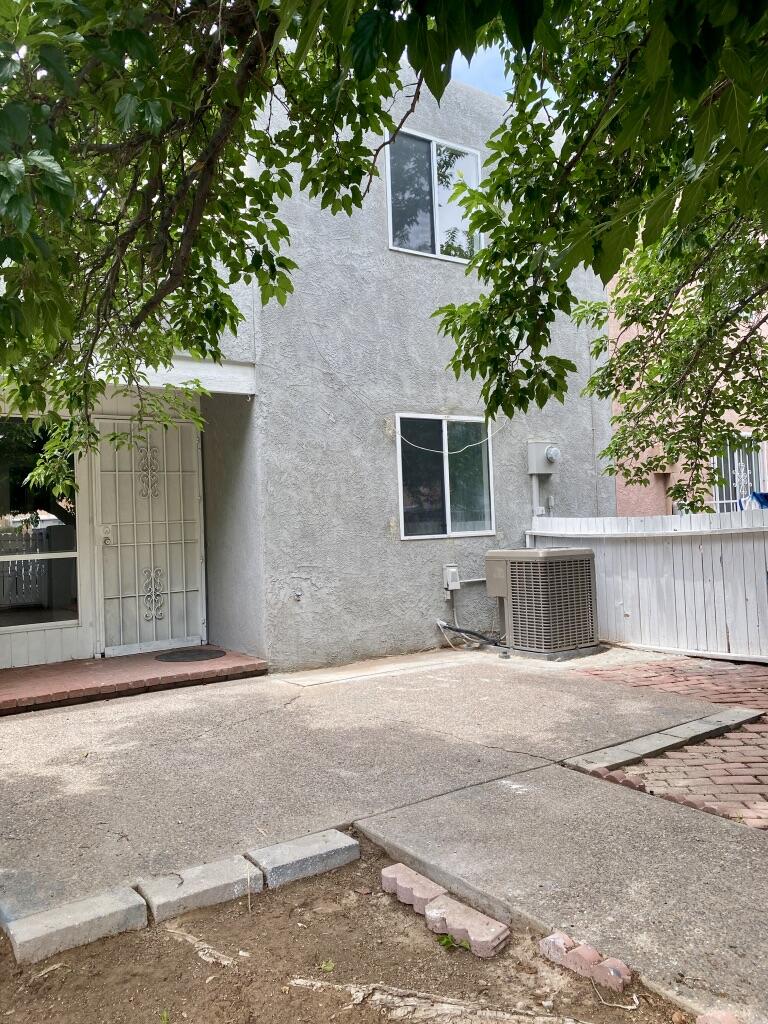 Charming Updated Townhome-Under $200,000! What an excellent opportunity to own a well-maintained, updated 3-bedroom townhome for under $200,000! This inviting home lives large with a spacious great room, a cozy kiva fireplace & an open kitchen perfect for comfortable living & entertaining.The primary bedroom is conveniently located downstairs, along with a 3/4 bathroom and laundry room. Upstairs you'll find two additional bedrooms & a recently remodeled bathroom. Enjoy peace of mind with recent major upgrades: New Roof (2024) New Stucco (2024) Updated Bathrooms New Refrigerated Air System (2023) New Furnace (2023)Step outside to a shaded front courtyard with mature trees--perfect for year-round enjoyment and entertaining. Don't miss this charming home w thoughtful updates & SW Style!