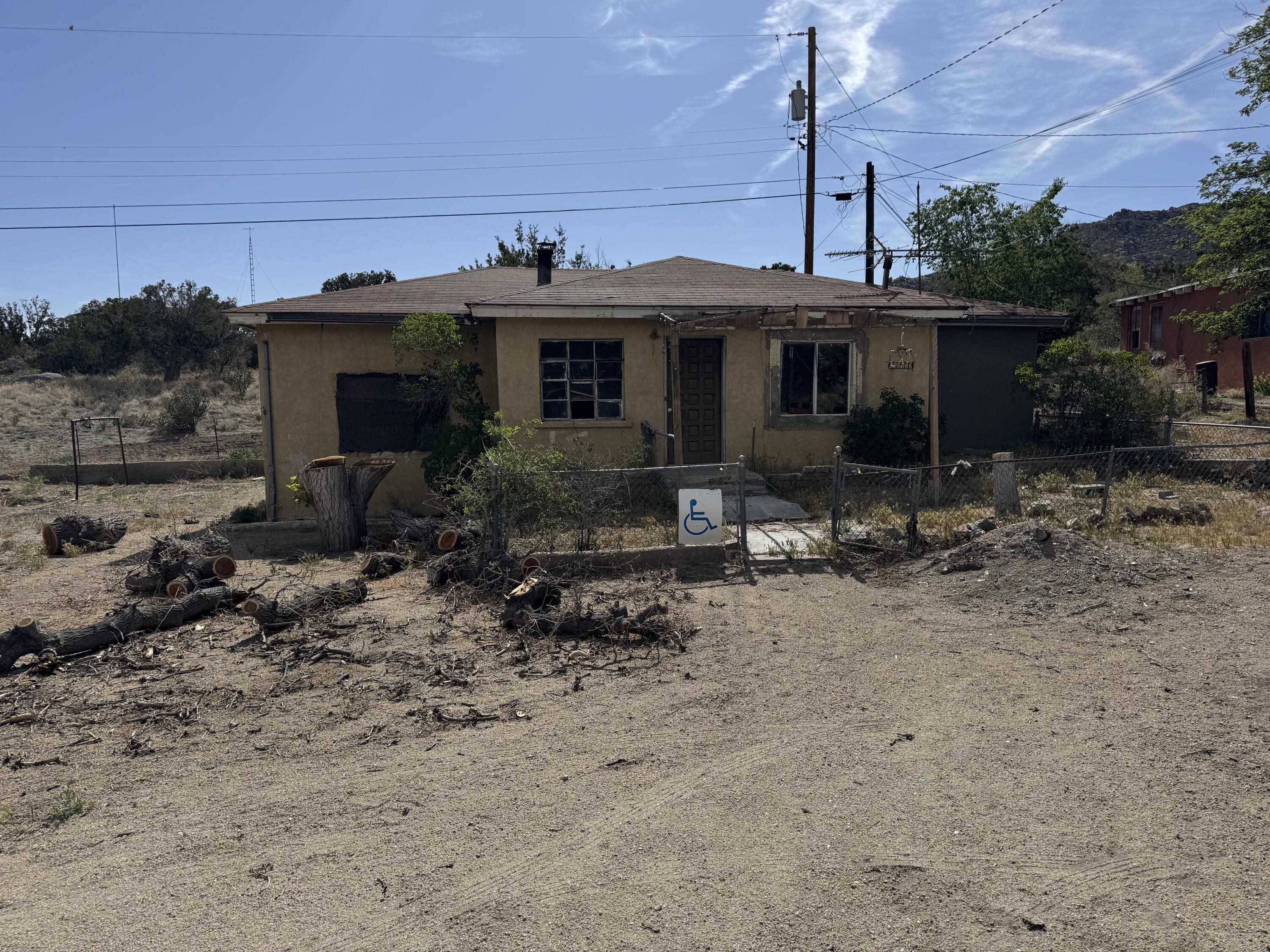 'Under Contract Taking Backup Offers',Calling all Investors! This Carnuel home sits on .29 Acres with endless possibilities.Conveniently located with easy access to Route 66 and I-40, this gem awaits new life. Property has a private Well , the Septic will need to be replaced. Prospective buyers are encouraged to diligently verify all details related to this property. Enter at your own risk, please take the necessary precautions when walking in the structure.