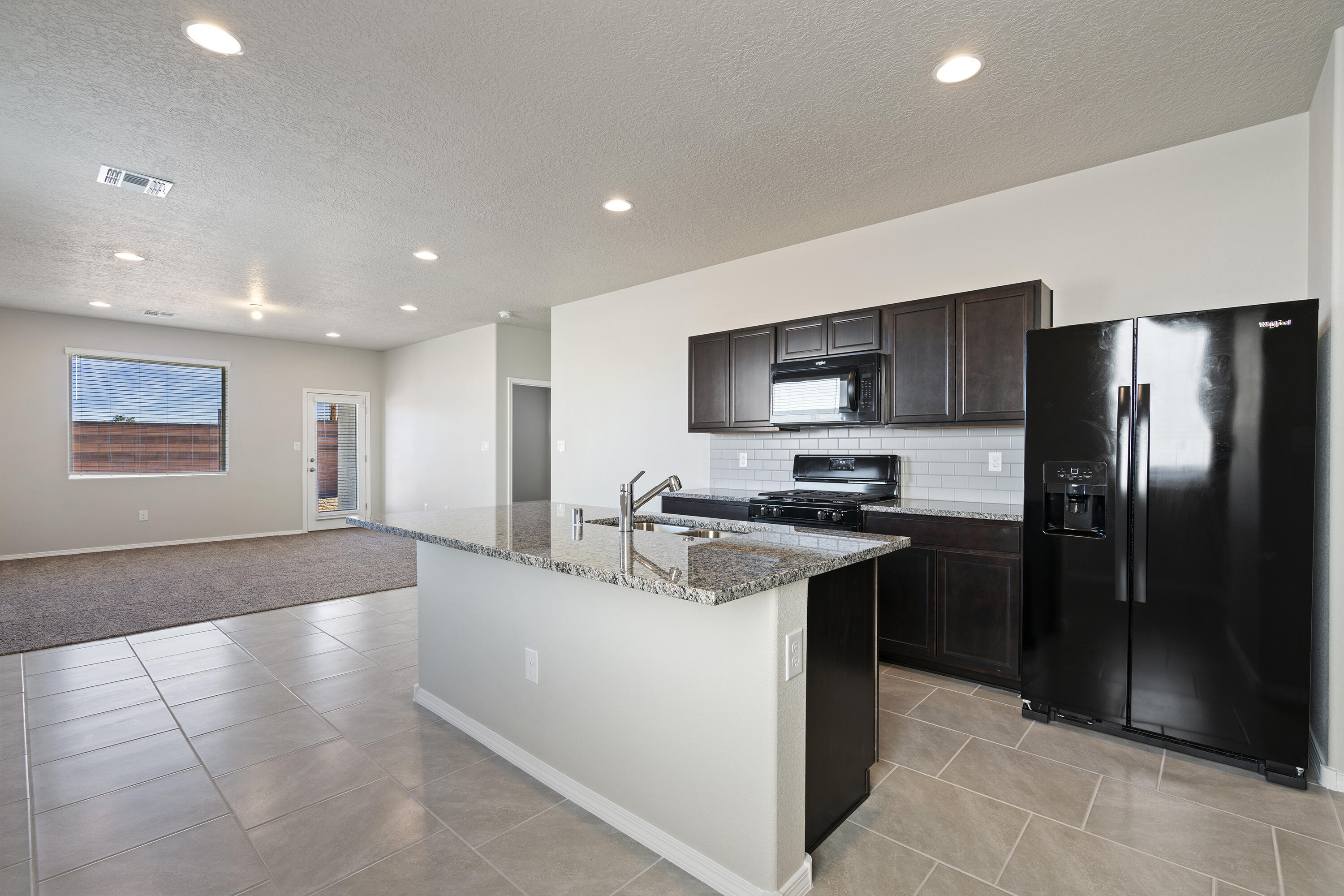 Welcome to Stonegate! We are thrilled to introduce you to the beautiful ''Sierra'' floorplan by D.R. Horton. This single-story 1,519 sq. ft. residence boasts 3 bedrooms, 2 baths, and a kitchen equipped with spacious granite countertops, Whirlpool(r) appliances, decorative tile backsplash, and a walk-in pantry. The primary bedroom features a walk-in closet and a large walk-in shower, while bedrooms 2 and 3 are conveniently located on the other side of the home. Additionally, the Sierra offers a covered patio, a 2-car garage, and comes with our HOME IS CONNECTED smart-home package, including Amazon Voice control, Front Doorbell, Front Door Deadbolt keyless entry Lock, Smart Home Hub, Smart switch Light Switch, and more. Don't forget to ask about our current incentives!