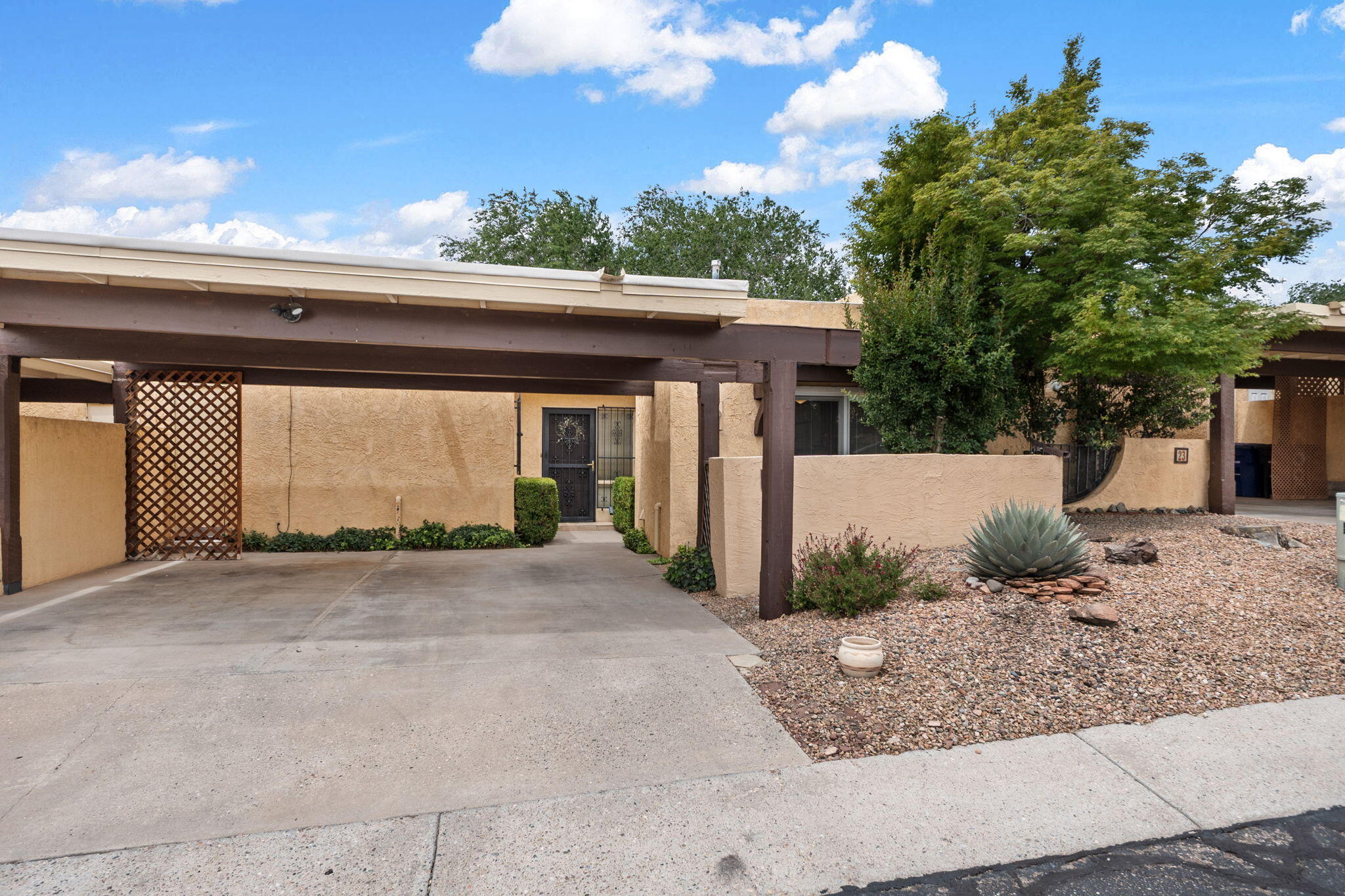 Welcome to this beautifully maintained 3-bedroom, 2-bathroom townhome in the quiet Casa Hermosa community--where comfort and charm blend perfectly. The inviting living area features cozy wood-burning fireplace and tasteful wood accents that add warmth and character. The kitchen shines with herringbone tile flooring and a stylish backsplash, plus all appliances convey, making move-in easy. Enjoy radiant heat flooring in the primary suite and a new roof installed November 2024 for peace of mind. Natural light fills the home through skylights and updated windows, highlighting spacious rooms with carpet and tile flooring. Relax in the lush courtyard or private back patio, with two covered parking spaces, storage, and community pool access. HOA covers water and sewer.  Call today!