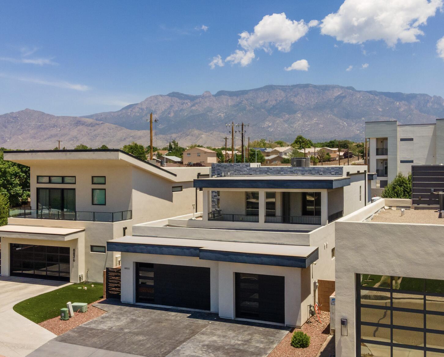 Stunning Custom Modern Home in Exclusive Gated Community w/ 3-Car Garage!&#8232; Step into an abundance of natural light, sleek, modern design, & high end finishes. Open-concept living space features sleek architectural lines & a refined chef's kitchen complete w/ premium appliances, a striking quartz waterfall island, spacious walk-in pantry, & stylish bar area. An oversized retractable glass pocket door off of the living room opens to a private backyard for seamless indoor-outdoor living. Luxurious primary suite offers a spa-inspired en-suite w/ a walk-in shower featuring dual shower heads, freestanding tub floating dual vanities, & a custom walk-in closet w/ premium built-in shelving. Upstairs: 2 large balconies & 2 spacious bedrooms w/ walk-in-closets joined by a stylish Jack & Jill ba