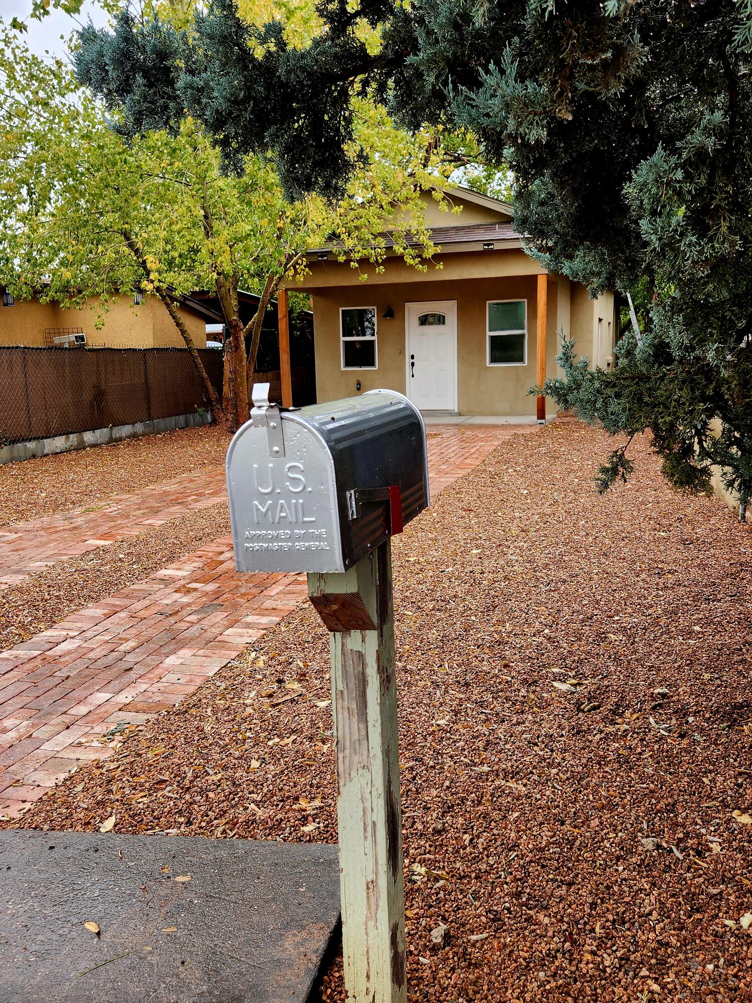 LIVE LUXURIOUSLY DOWNTOWN A GREAT PRICE.. This is a completely rebuilt adobe home.   Architecturally designed additions to the front and back of the house, skylights, plaster walls, granite counter tops and new stainless steel appliances make this place zoom.  One block from Bosque bike trails, one block from the Hispanic Cultural Center, two minutes from downtown, two minutes from I-25, 7 minutes from the airport and convenient to hospitals.   Finishing touches include a gorgeous brick driveway by master  layer, Guiseppi Gorman