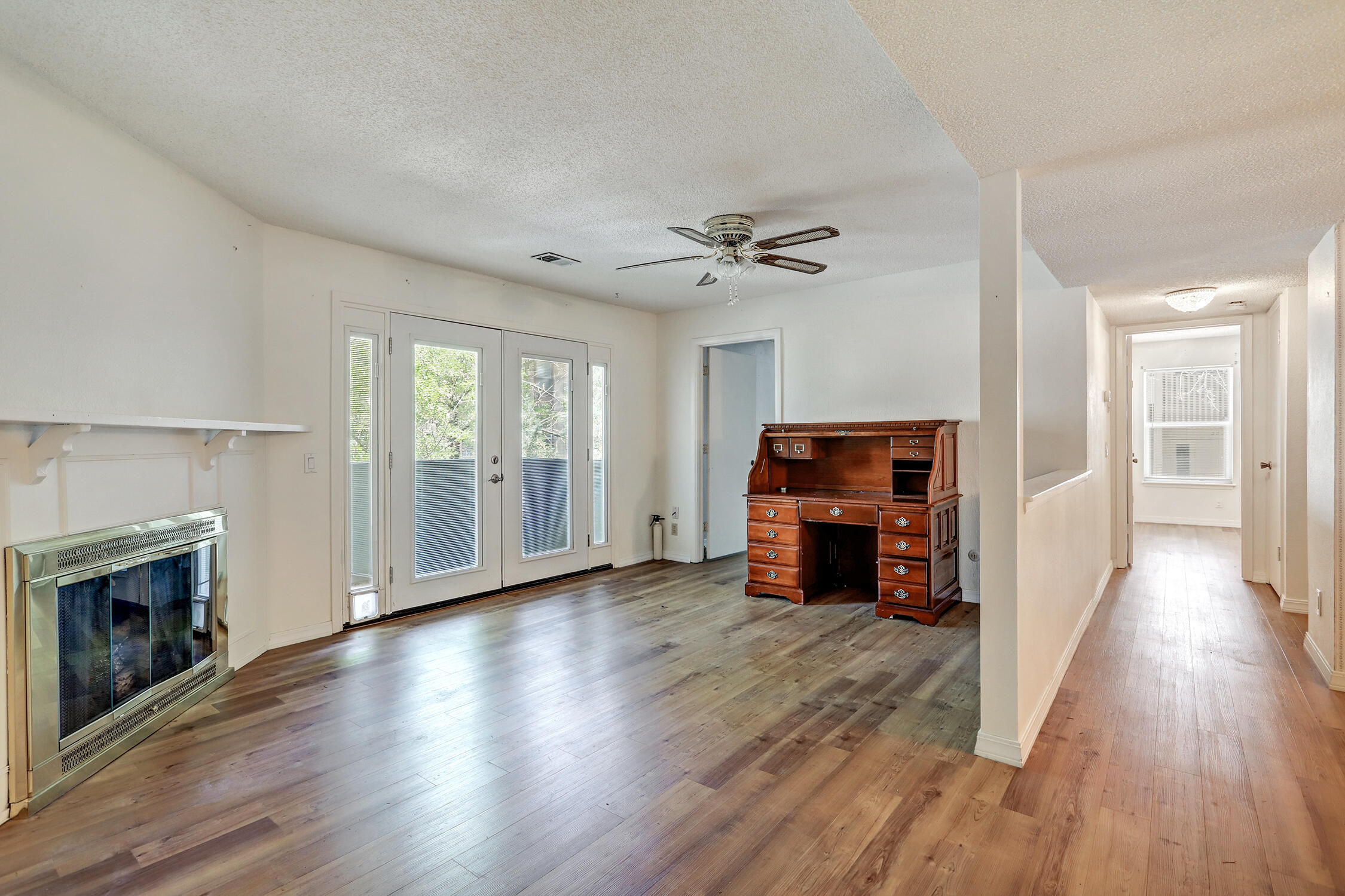 Beautifully updated condo in a prime central location! This home features a modern kitchen with sleek quartz countertops, stainless steel appliances, and updated finishes throughout--all completed within the past 3 years. Both bedrooms offer spacious walk-in closets, and the open floor plan includes luxury vinyl flooring (no carpet!) and a private balcony perfect for relaxing. The bathroom has been recently renovated with quartz counters and a stylish new shower completed in the last year. Additional perks include a private storage room downstairs. The gated community offers fantastic amenities such as a pool, spa, clubhouse, and playground. HOA covers all utilities except electricity. With easy freeway access and just minutes from shopping, dining, and more, this condo truly has it all!