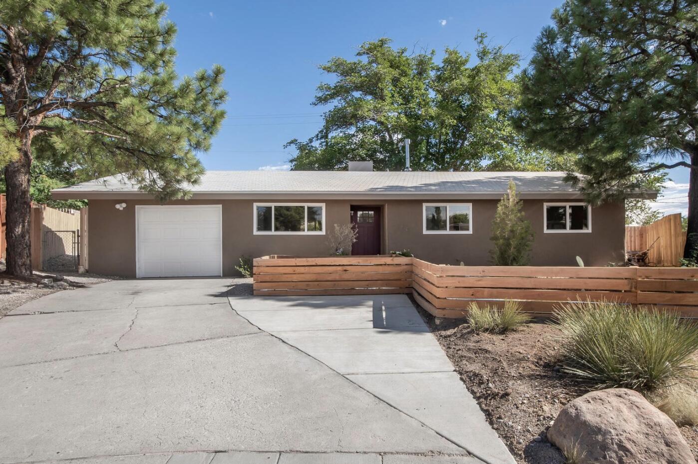 Wonderfully remodeled NE Albuquerque Heights Home! Freshly painted, Vinyl plank floors, updated kitchen with new cabinets, stainless steel appliances, quartz countertops, remodeled bathrooms, Mastercool unit and mature trees. This is a wonderful area with easy access to restaurants, businesses, I-25, Uptown, etc. Come by and see this wonderful home today!