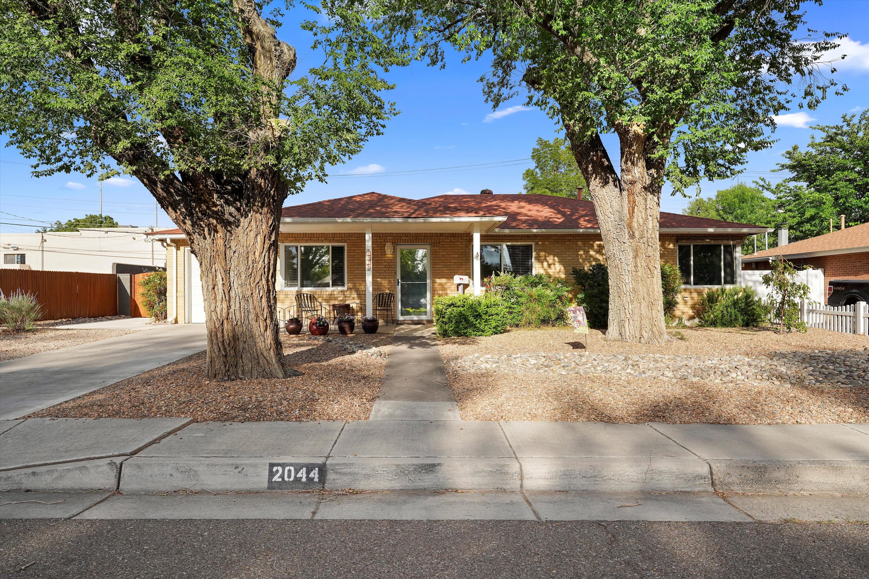 Charming 3-bedroom home in the heart of NE! Enjoy a bright, open-concept living and dining area that's perfect for relaxing or hosting friends. Generously sized bedrooms offer ample comfort, while the functional kitchen has everything you need. Step outside to your own small oasis: a backyard retreat complete with a covered patio. Great location near shopping, dining, and easy highway access.