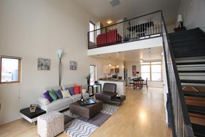 1BR, 1BA Loft in the heart of vibrant EDo. 1000 square feet, this property offers a spacious and well-designed layout that maximizes comfort and style, complete with tenant for immediate cash flow. Nestled in a prime location, this condo is just steps away from essential amenities and cultural hotspots. Efficient commuting options are readily available, with both the Downtown Albuquerque Rail Runner Station and ART - Downtown Station close by, ensuring you are well-connected to the rest of the city. The property epitomizes the perfect ''lock and leave'' lifestyle, ideal for those who cherish safety, convenience, and access to local restaurants and entertainment. This condo is more than just a living space; ; it's a vibrant urban oasis for the modern dweller.