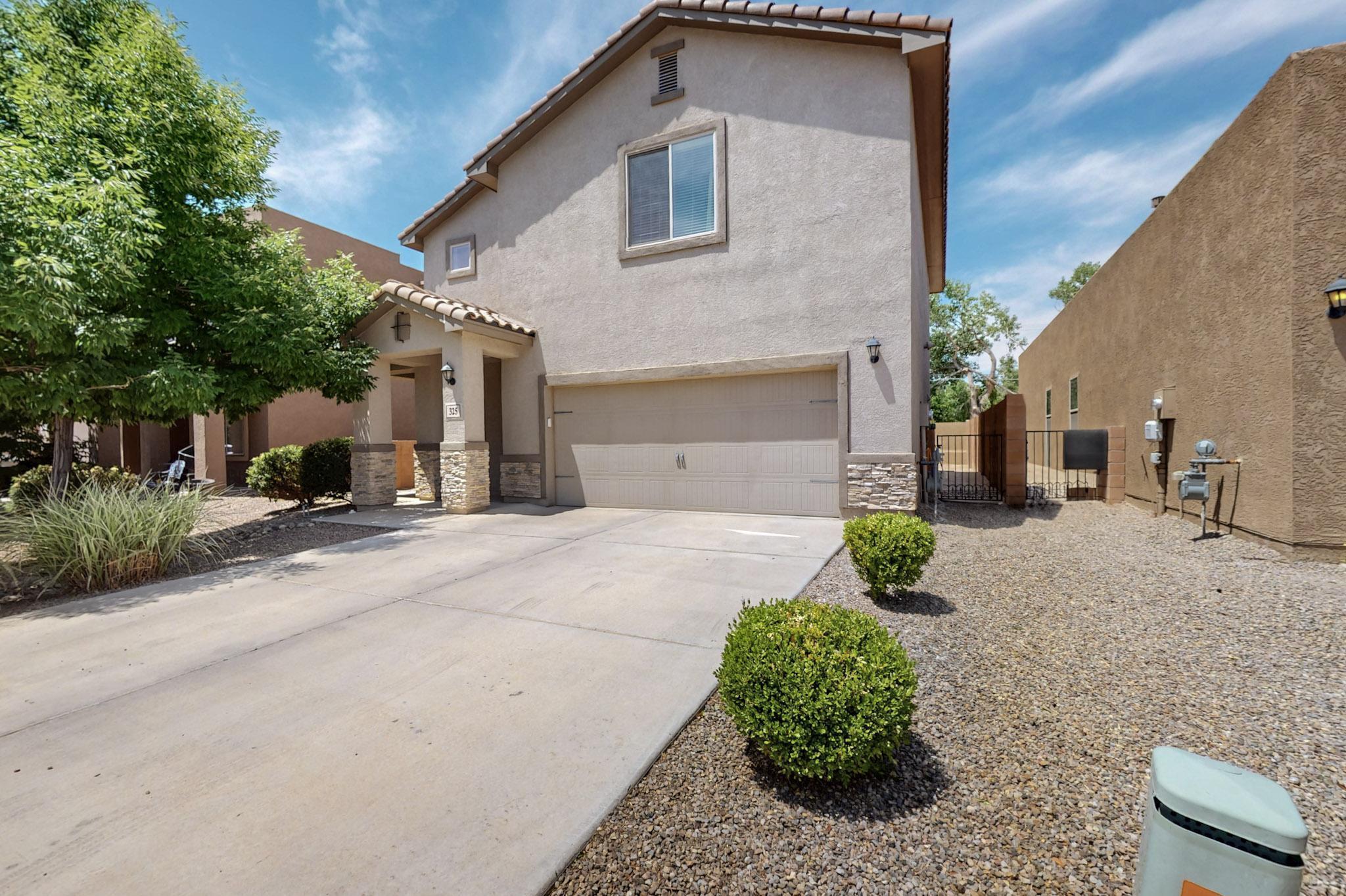 Welcome to this beautifullyspacious and inviting FOUR-bedroom, 2.5-bath home located in a quiet, secure gated community in ABQ's South Valley. This rare gem offers a thoughtfully designed open floor plan, featuring a large great room & a dining area easily accommodating a table for eight-perfect for entertaining! Inside you'll find warm earth tones, elegant tile, and LVP flooring throughout, creating a welcoming atmosphere. Though only 8 years old, this home feels nearly new thanks to its clean condition and tasteful finishes.  The chef's kitchen is a true delight, boasting gleaming granite countertops, ample cabinetry, and a spacious walk-in pantry-both functional & stylish! Retreat upstairs to your primary suite, complete with dual sinks, a soaking tub, and large closet. (see more)