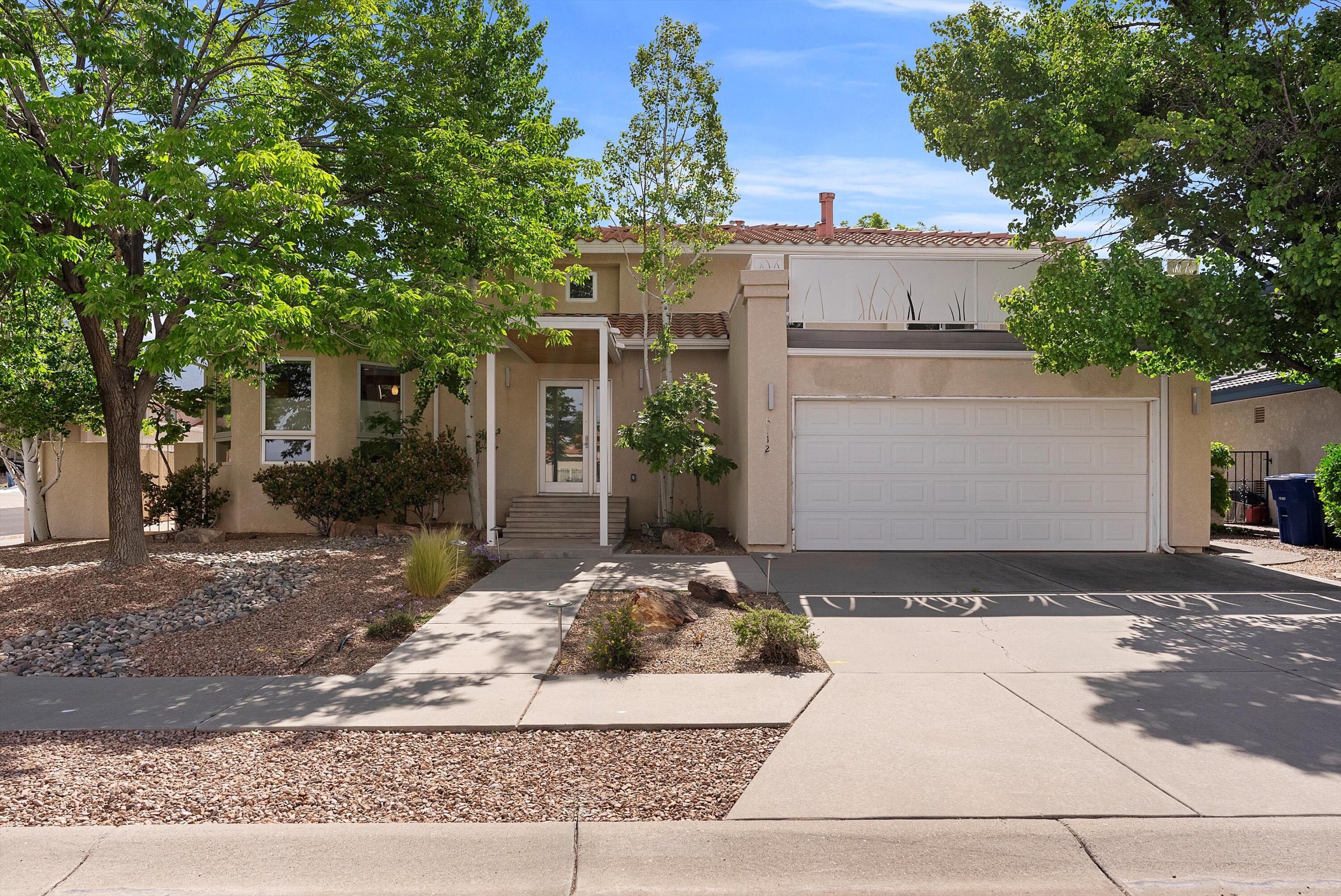 Welcome to this stunning home in Coachman Estates.  Offered by the original owner, this home underwent an extensive renovation in the past including a larger living area with high ceilings, a new primary suite addition with a modern bathroom, and an incredible backyard designed by a landscape architect featuring a large covered patio with tongue & groove wood ceilings.  Spacious kitchen with abundant storage, wet bar, and 2 eating areas.  An office area was added as well on the main level.  Upstairs you'll find a loft as well as 2 bedrooms and a full bathroom.  Numerous possibilities on the basement level depending on your needs.  Come see this lovely property today.