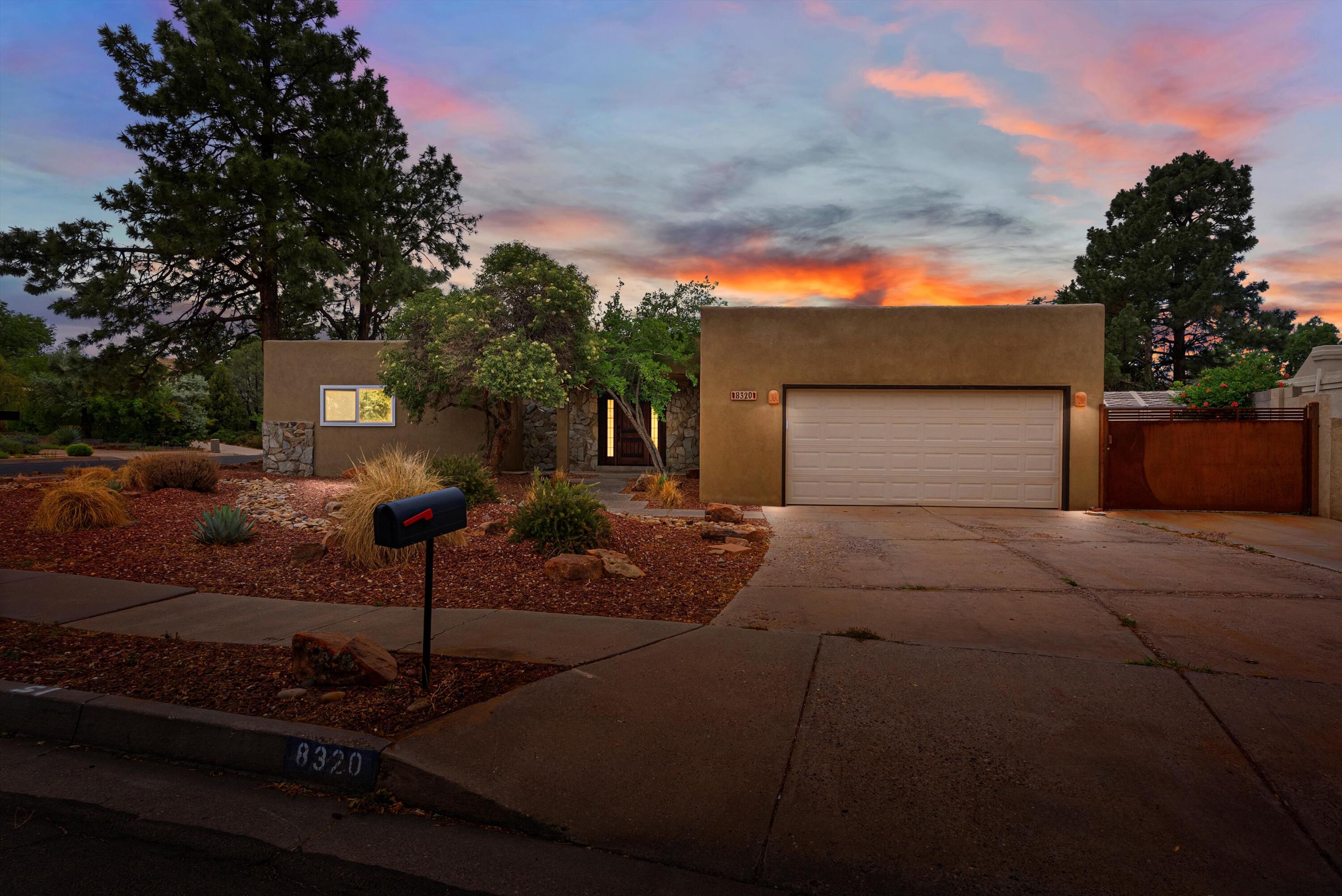 Beautifully renovated home on a corner lot in a quiet, desirable neighborhood near top-rated schools! . This modern and stylish home features an open floorplan filled with natural light, refrigerated air, and stunning views of the Sandia Mountains. Enjoy tasteful updates throughout, including a spacious kitchen, updated finishes, and a versatile bonus sunroom--ideal as a home office, gym, or second living space. The large backyard is perfect for relaxing or entertaining. Just minutes from great dining, shopping, and parks--this one has it all!