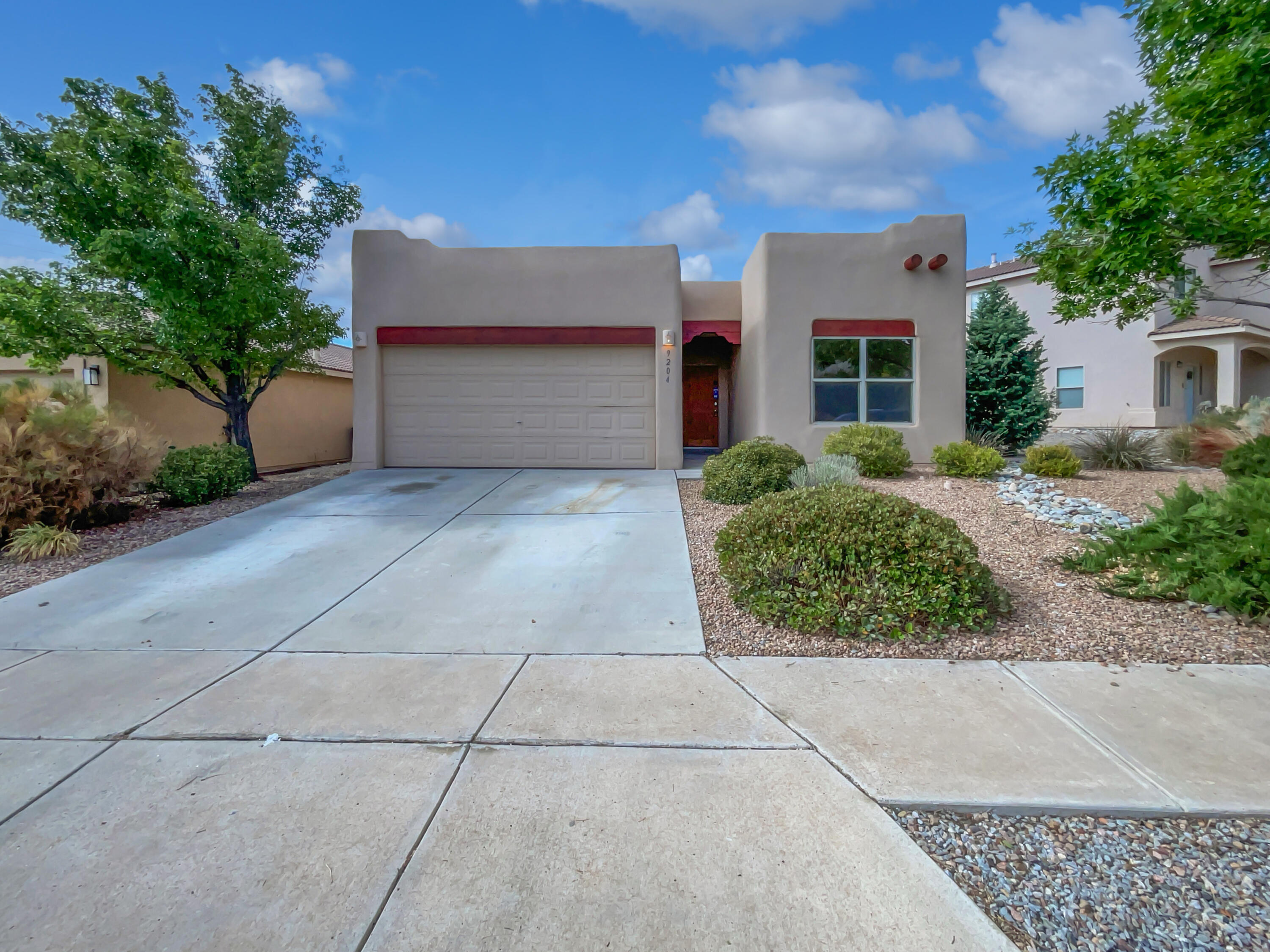Welcome to this fabulous area!  A fireplace and a soft neutral color palette create a solid blank canvas for the living area. Relax in your primary suite with a walk in closet included. The primary bathroom is fully equipped with a separate tub and shower, double sinks, and plenty of under sink storage. Take it easy in the fenced in back yard. The covered sitting area makes it great for BBQs! Don't wait! Make this beautiful home yours.
