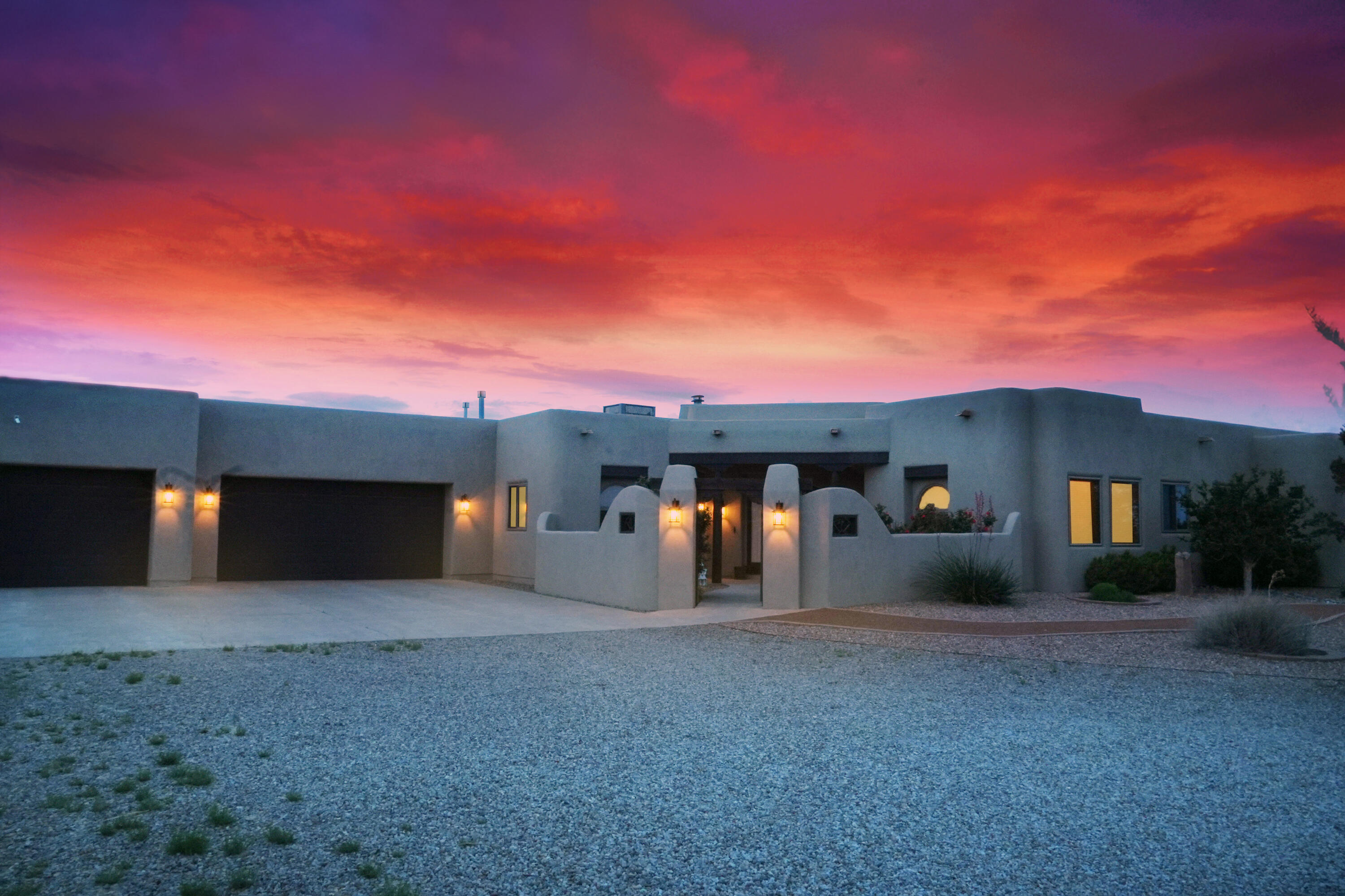 Luxury custom build by Crescent Homes on 1.47 acres in Rio Rancho Estates with breathtaking Sandia Mountain views. This meticulously maintained one-owner property offers 4 bedrooms, 3 bathrooms, and 3,210 sq ft of radiant-heated living space. Features include a private-entry suite ideal for guests or a home office, 3 elegant fireplaces, central vacuum system, and a fully finished 3-car garage with ample storage. Brand-new roof, new stucco, and never-used stainless steel appliances add modern convenience to timeless quality. Enjoy expansive views from nearly every room and direct backyard access with space to create your dream outdoor living space. Peaceful, private, and perfectly situated--this is New Mexico living at its finest.