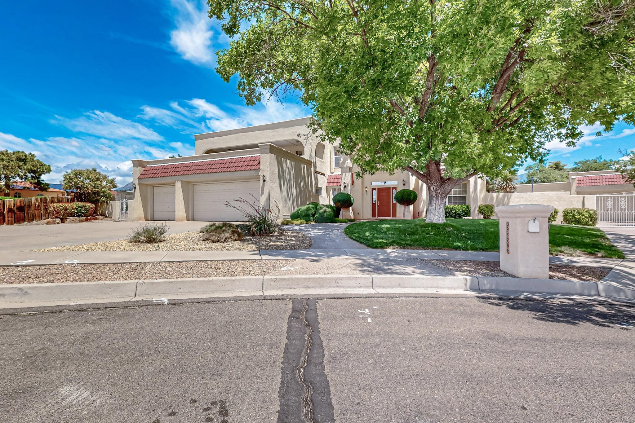 Discover this magnificent 4-bedroom oasis in the esteemed La Cueva School District, positioned on a sprawling .35-acre lot at the end of a tranquil cul-de-sac. The property features an impressive 800 sq ft detached workshop, ensuring both functionality and style, complete with heating. For year-round comfort, the primary residence is equipped with refrigerated air. The expansive 3-car garage offers abundant storage and parking space for your vehicles. Inside, the home dazzles with luxurious granite countertops, seamlessly blending sophistication with everyday living. This extraordinary residence invites you to indulge in modern living while enjoying the serenity of an exclusive neighborhood. Experience the harmonious balance of luxury and convenience that awaits you.