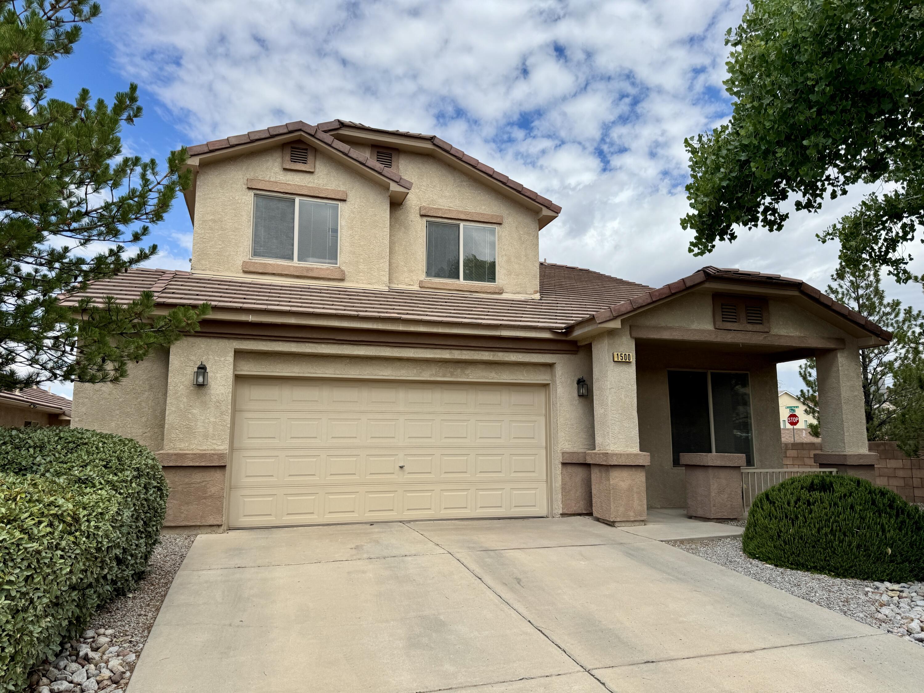 Welcome to 1500 Peppoli Loop in the desirable Asante at Cabezon community! This well-maintained 3 bed, 2.5 bath two-story home features an oversized 2-car garage with room for a workbench and included cabinets. Enjoy outdoor living under the extended pergola-covered patio. The kitchen was updated in 2019 with black stainless appliances, granite counters, and a large island opening to the great room. Upstairs offers a loft and spacious primary suite with fireplace, dual walk-in closets, garden tub, and separate shower. Newer ceiling fans, updated baths, and 2 A/C units for comfort. Water heater replaced in 2019. Seller offers $7,000 credit for flooring or rate buydown with an acceptable offer. Close to parks, trails, shopping, and Rust Hospital. Call your realtor to schedule a showing!