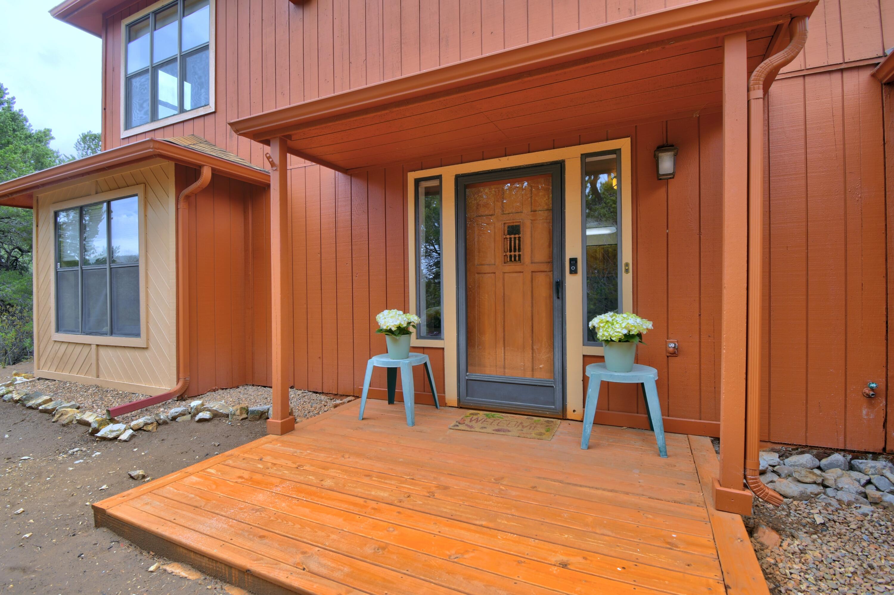 Well Maintained Mountain Home in the Heart of Tablazon, not far off Old 66- 12  minutes from Tramway!  Move-In Ready!  This home has been lovingly cared for, throughout the years.  Roof was replaced in October 2019,  Septic System replaced in June  2020, Downstairs Wood Burning Stove was replaced in April 2023.  Kitchen has newer Stainless Appliances; Refrigerator replaced in October 2023, Electric Built in Stove/Oven and Dishwasher replaced in April 2024.  Wonderful Deck area, at the back received a face lift in October 2024, along with the Front deck.  The Carpet in the bedrooms and Staircase were installed in December 2024.  This Tablazon Beauty has a very good well that has been monitored by the County for the last 8 years.  This Home sits High on the mountain and has awesome views!