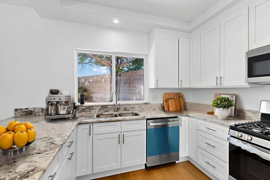 Fully renovated & full of style this 4-bed gem in a quaint cul-de-sac near La Cueva High shines with modern upgrades! Vaulted ceilings lift the living space, natural light pours through new windows, and the open kitchen stuns with granite, stainless steel appliances & sleek cabinetry. Fresh paint, new carpet, refrigerated air, synthetic stucco, and side yard access complete the package. Bright, bold, and move-in ready -- this one just feels like home.