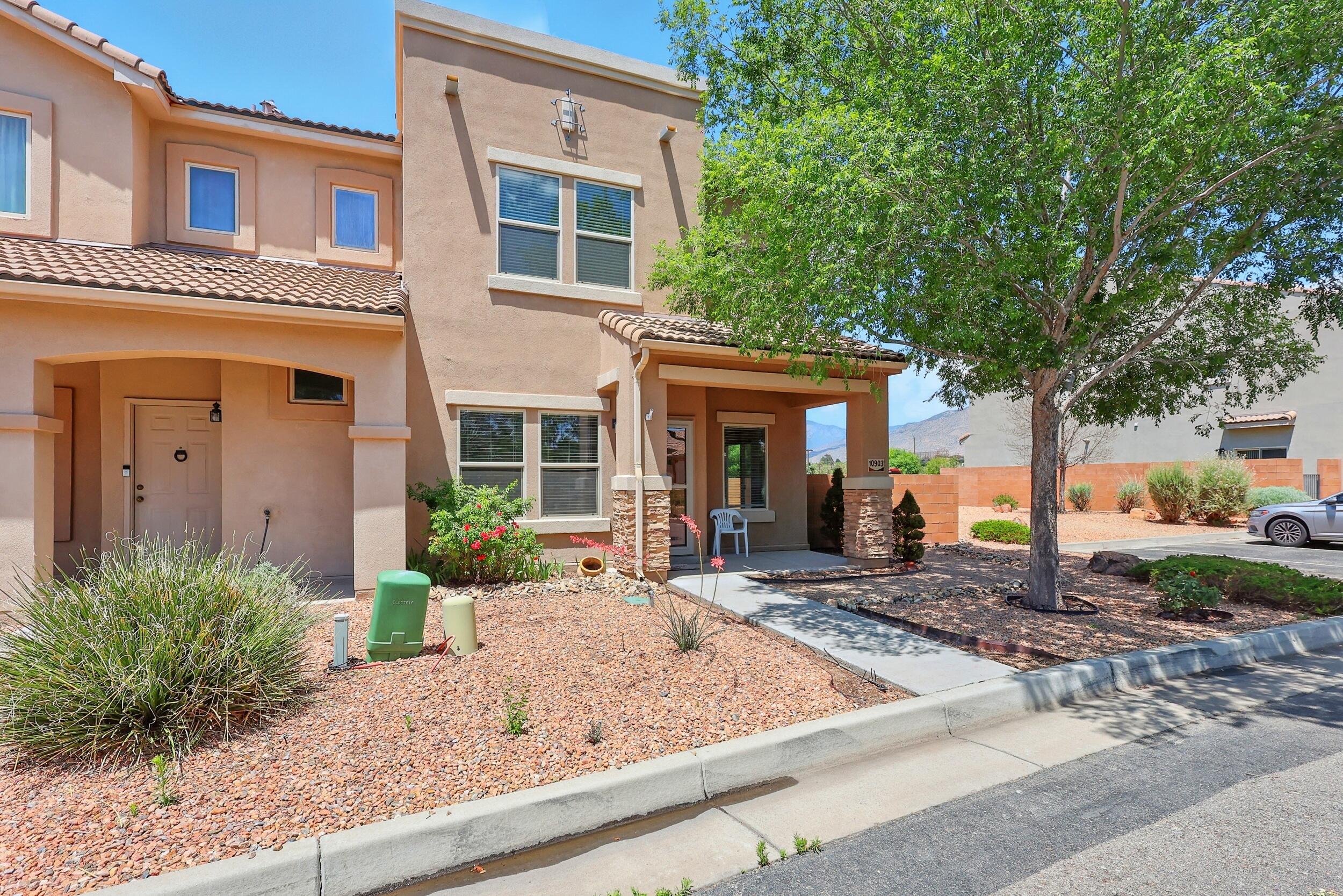 Located in the gated Presidio subdivision, this two-story townhome offers 3 bedrooms, a 2-car garage, and stunning mountain views. Enjoy a peaceful neighborhood just minutes from Kirtland Air Force Base. Brand-new carpet was installed on June 4, 2025, and the home features refrigerated air for year-round comfort. The community includes a clubhouse, gym, park, and scenic walking paths, providing the perfect blend of recreation and relaxation. With a functional layout and low-maintenance living, this home is ideal for those seeking comfort, security, and convenience in one of Albuquerque's most desirable gated communities. There is also an assumable VA loan at  a 2.375% interest rate for those that qualify!