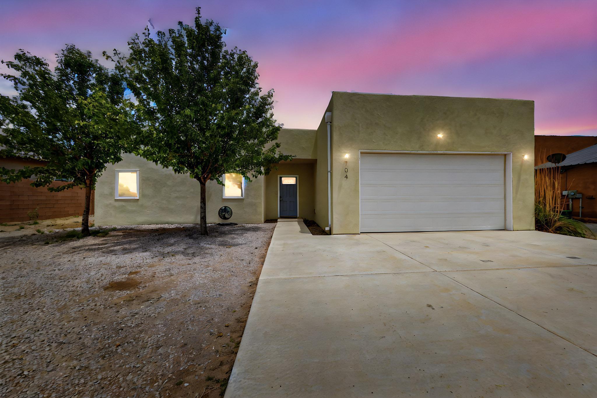 Welcome to this beautifully crafted single-story custom home situated on a spacious 1/2-acre lot with mountain views and backyard access. This move-in ready property features 3 bedrooms, 2 bathrooms, and a 2-car garage. Designed with an efficient layout and modern finishes, including polished concrete floors, refrigerated air, and low-e windows. The chef's kitchen boasts quartz countertops, stainless steel appliances, a pantry, and sleek cabinetry. The bright and open floor plan includes a luxurious primary suite with a walk-in closet, custom double vanity, and walk-in shower. Recent upgrades include a new TPO roof (2019) and synthetic stucco (2022). No HOA. City water. Plenty of space for RVs, trailers, or recreational toys!