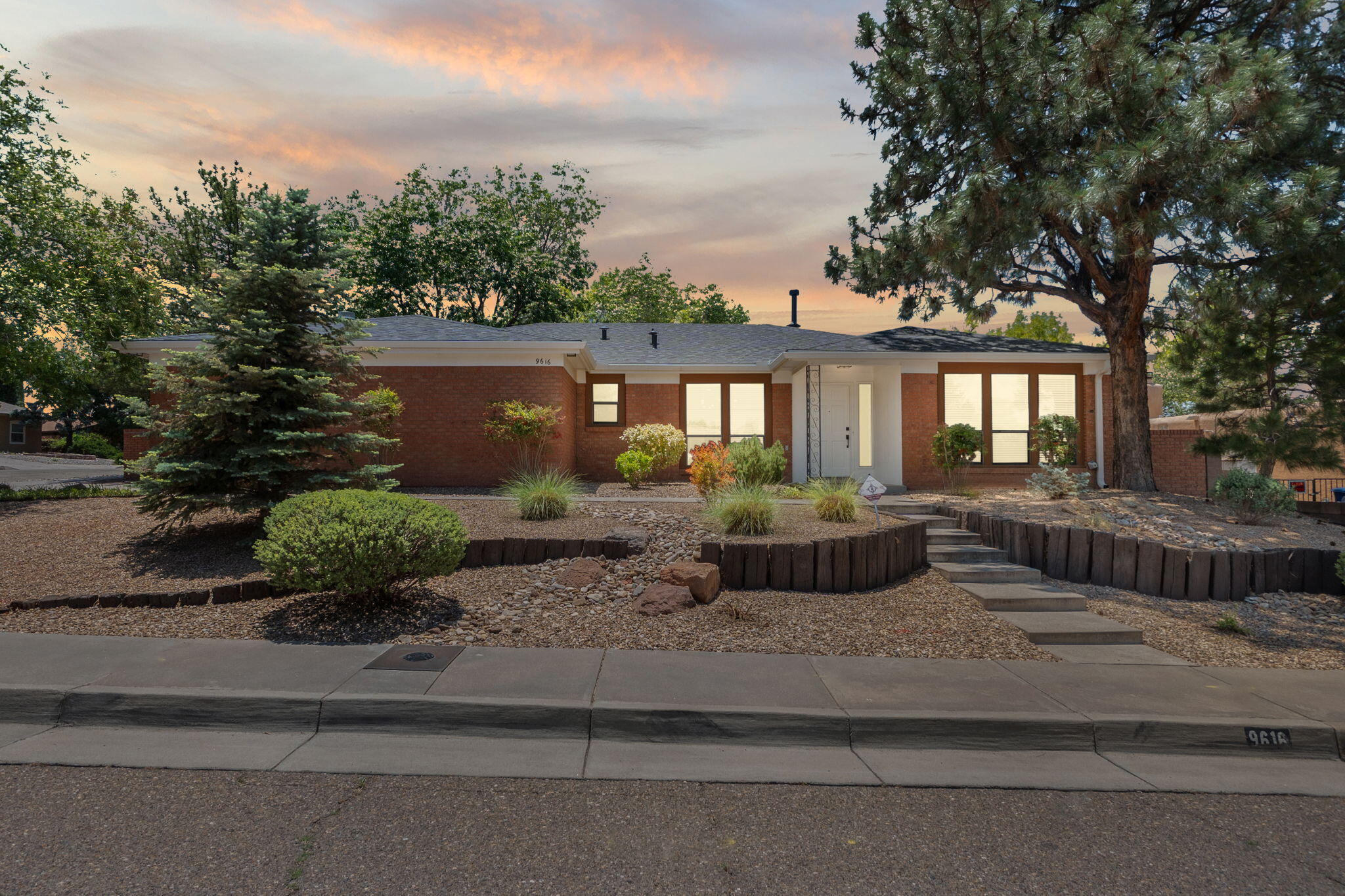 Experience modern living in this stunning fully remodeled 4-bedroom, 2.5-bath home located in the La Cueva school district and the highly sought-after Academy Hills neighborhood. Home features new roof and refrigerated air. From the moment you arrive, you'll be captivated by the beautifully landscaped yard and views of the Sandia Mountains. Inside, no detail has been overlooked--this home features a spacious and open layout, custom finishes, and a perfect blend of style and functionality.   Whether you're entertaining guests or enjoying quiet evenings at home, this property offers the ideal setting.