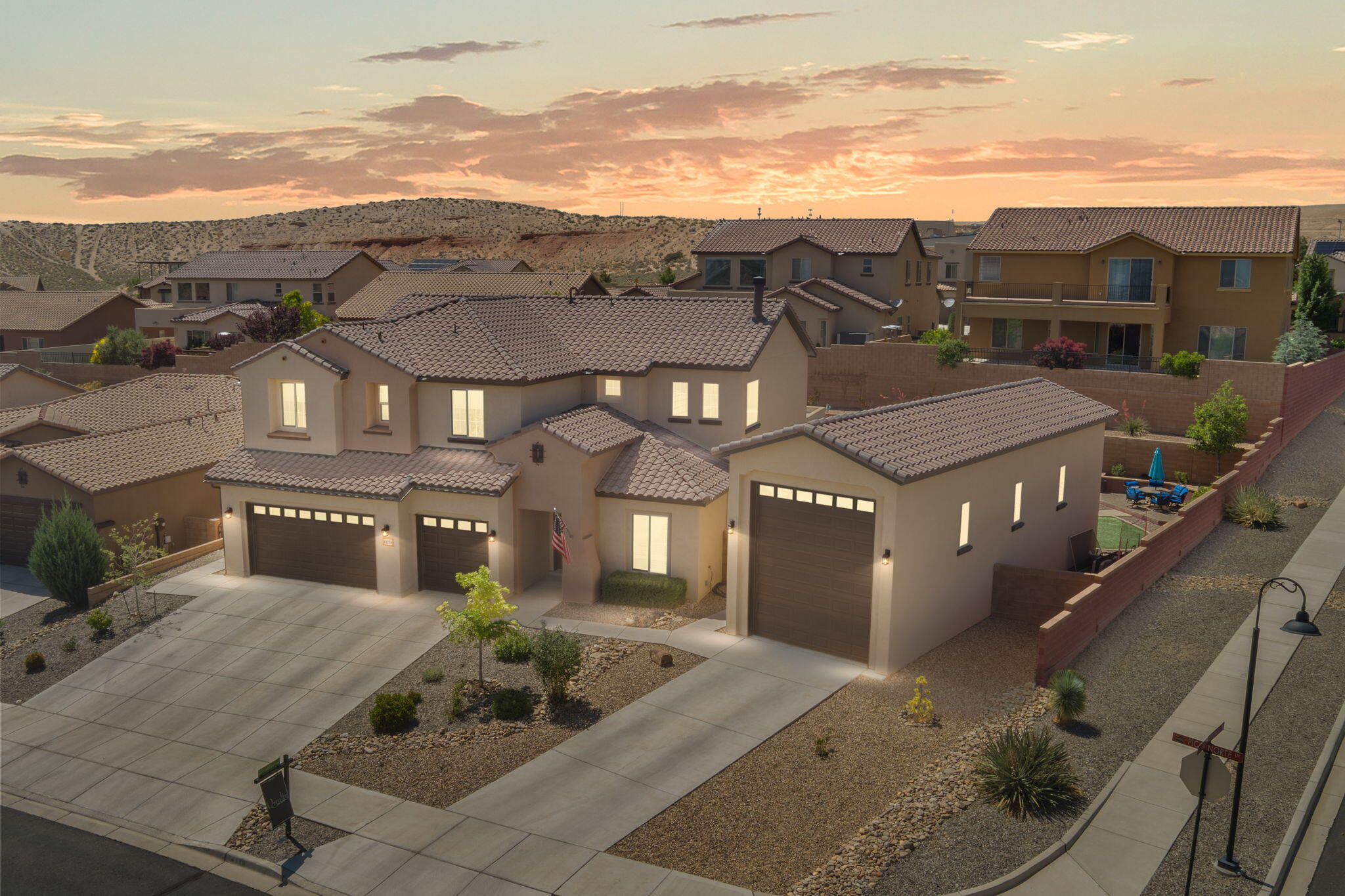 Stunning Pulte Home in the gated community of Tres Colinas! This well-maintained, one-owner two-story home offers 6 spacious bedrooms, 3.5 bathrooms, and both a 4-car garage and RV garage. Situated on a desirable corner lot, enjoy breathtaking mountain views and exceptional outdoor living with a fully landscaped front and backyard, complete with a fire pit--perfect for entertaining. Built in 2017, this light and bright home features beautiful cabinetry, quality flooring, and plenty of natural light throughout. A must-see property that combines comfort, space, and style in one of the area's most sought-after communities!