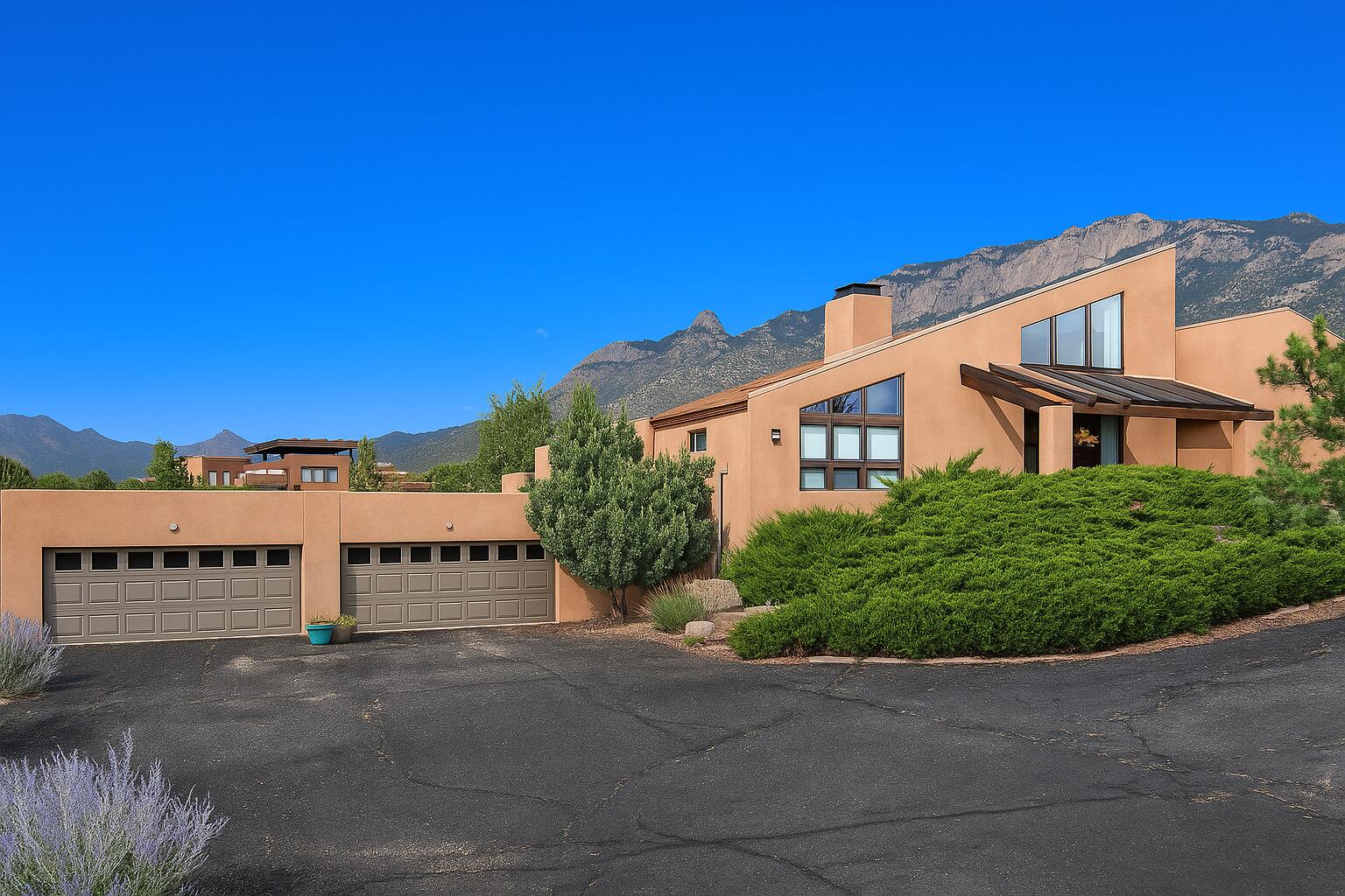 Sandia Heights! Contemporary Southwestern with Mid-Century influences designed by award-winning architect Ron Hutchinson, set on a .85-acre lot. Main-floor bedrooms each have patio access and views! The primary suite offers stunning mountain views and a patio with beautiful sunrises. Enjoy sunset from the west patio off the great room. Large windows throughout fill the open-concept living space with natural light all day. A showstopping central fireplace anchors the great room. Updated kitchen and kitchenette feature granite counters and soft-close cabinetry. Ideal for multigenerational living with a four-car garage, finished daylight basement with bed/living area, kitchenette, and bath--plus a spacious loft with full bath, open area, and tucked-away nook. Newer roof (2022) and HVAC (2024)