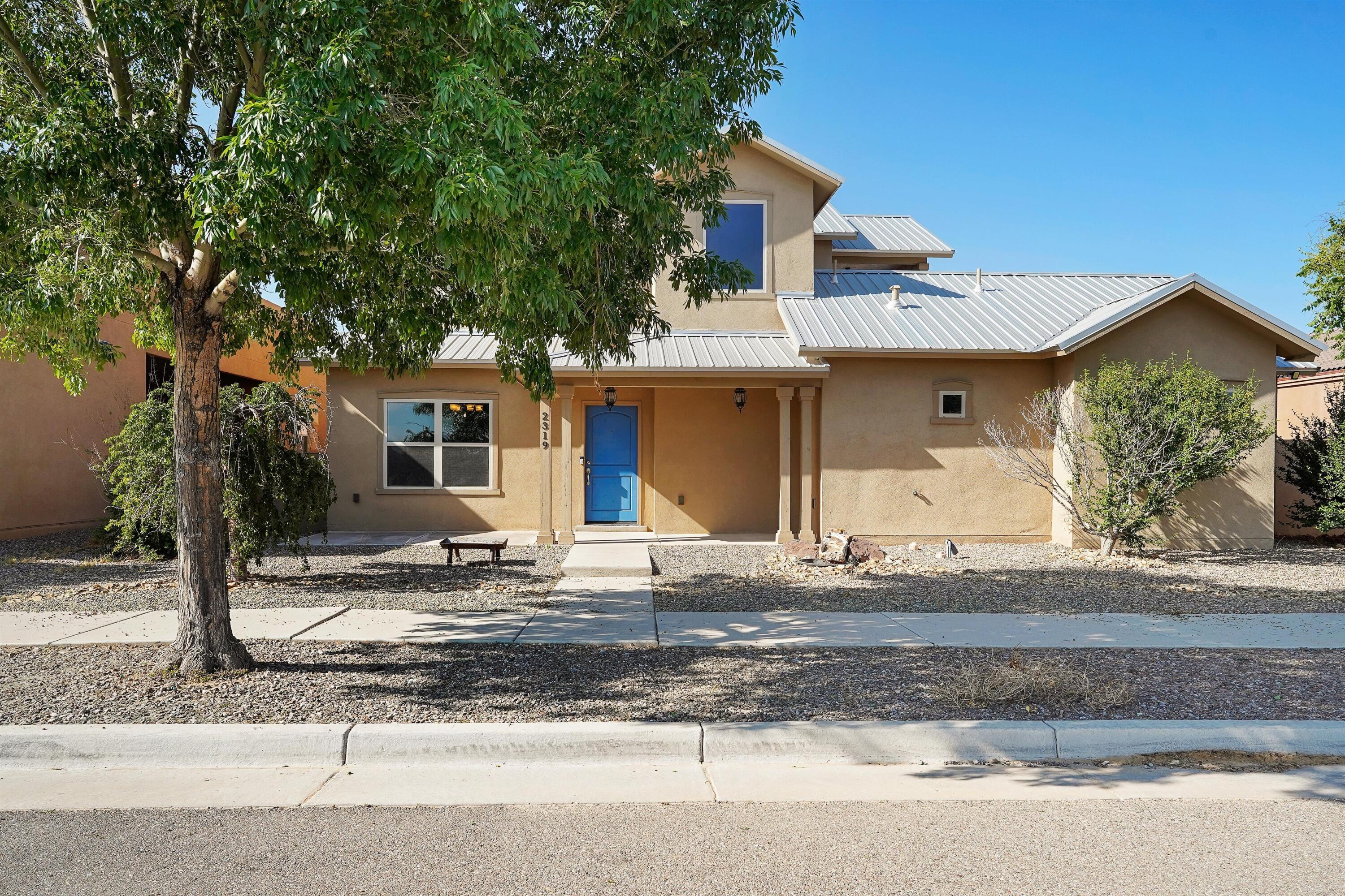 Seller offering a $6k flooring credit.Spacious 2-story single-family home in the desirable Mesa del Sol community. Features 3 bedrooms, 2.5 bathrooms, a 3-car garage, and a loft area upstairs. Main floor includes 9' ceilings, a cozy living room with fireplace,  kitchen with large granite island, walk-in pantry, and the primary bedroom suite--complete with a 3/4 bath and oversized walk-in closet.   Dual-zone heating and cooling for comfort and efficiency.Upstairs features a versatile loft and two additional bedrooms, each with their own walk-in closets.  Upstairs bedroom doors double as chalkboard surfaces -- a fun and creative feature perfect for kids to draw, write, and express their imagination every day!
