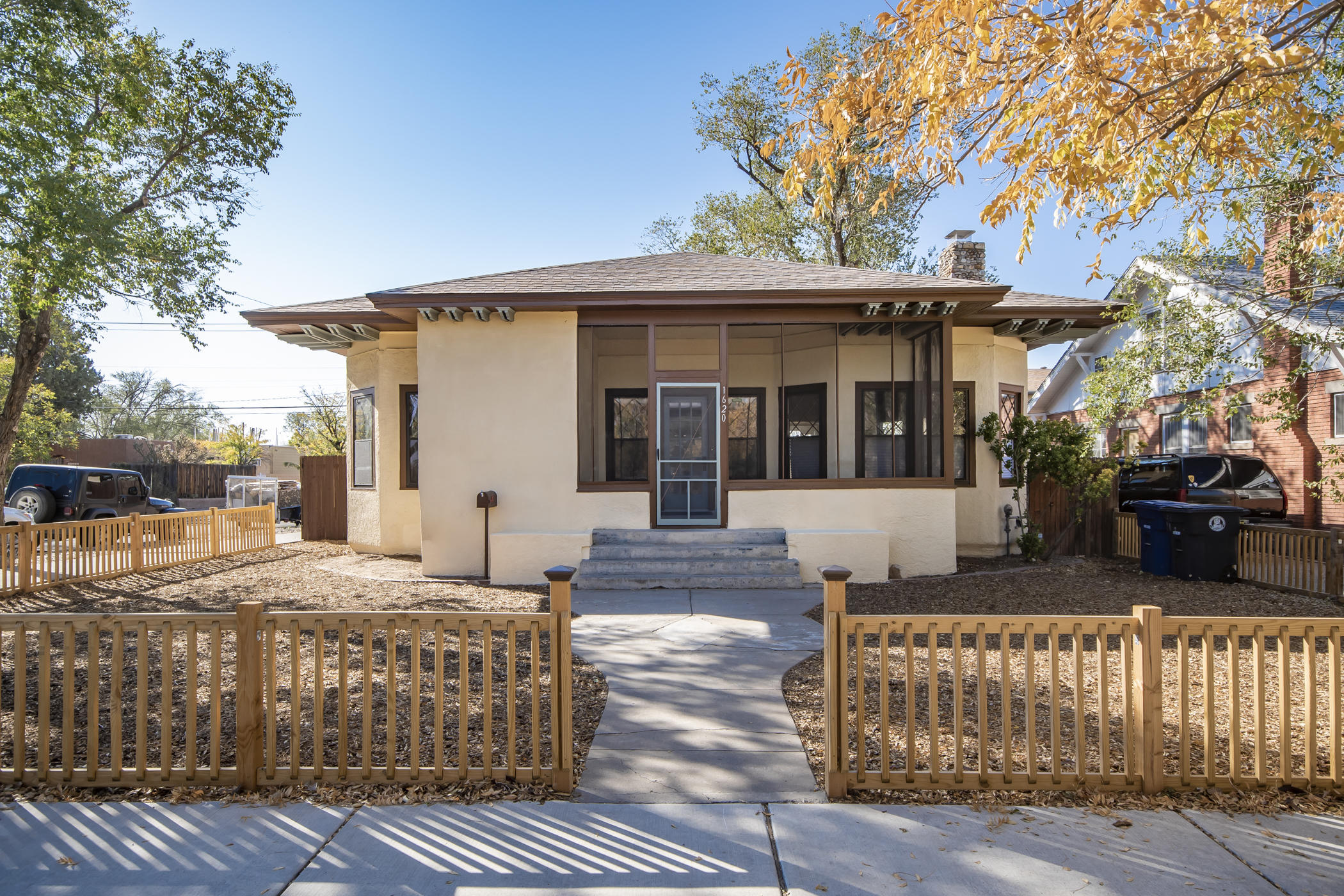 Welcome to this beautifully remodeled 1920s Sears & Roebuck kit home--an Albuquerque gem on Silver Ave SE, aka Bicycle Boulevard. Just steps from UNM, hospitals, restaurants, ART transit, Nob Hill, and Downtown. This 3-5 bed, 3-bath blends vintage charm with modern upgrades: 10-ft ceilings, 15 rolled-glass windows, and a river stone fireplace. 2019-2020 updates include kitchen, master bath, roof, HVAC, plumbing, electrical, and more. Enjoy a  finished lower level with a 3/4 bath, cabinets and sink--ideal for media, guests, or additional income. Outdoors features a new patio, xeriscaping, fenced yard, and a 2-car garage. Don't miss this rare historic treasure in a top walkable, bike-friendly location!  Current photos are from a past listing with similar furnishings. New photos coming soon!