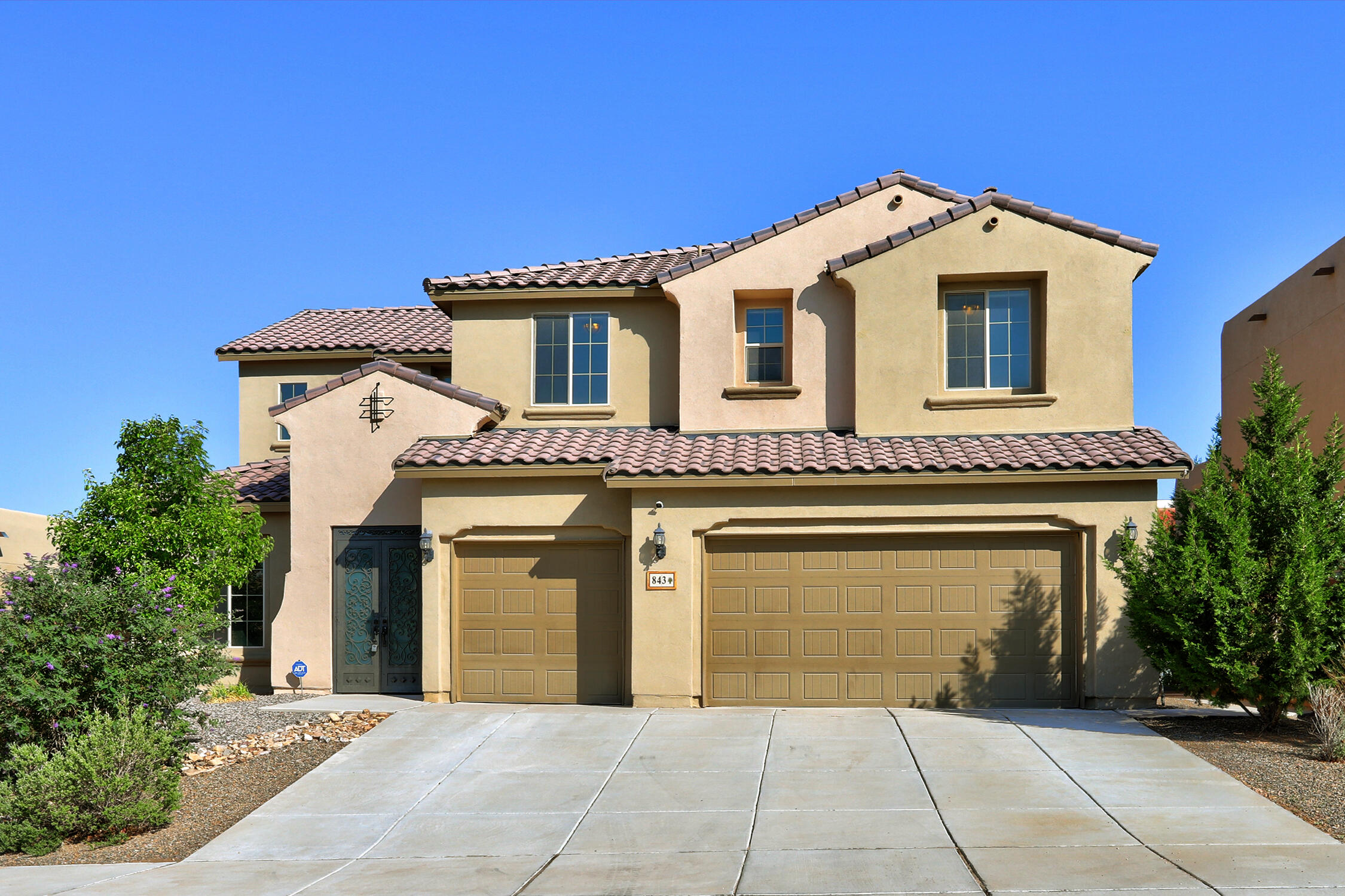 Experience the joy of living in this beautiful 6-bedroom residence located in the sought-after Tres Colinas community! With a thoughtful and open floor plan, this home features a primary bedroom & a guest suite or in-law quarters on the main level, providing exceptional flexibility. The great room invites you in with its delightful fireplace, serving as a gathering spot for family & friends. An office downstairs makes working from home a breeze. Venture upstairs to find 4 more bedrooms & 2 additional bathrooms, plus a loft area that adds character & space. Enjoy over 3,800 square feet of living area, & step outside to a fantastic outdoor living space equipped with a covered porch, seating area, built-in grill, & a firepit surrounded by stylish pavers. See it, love it, own it