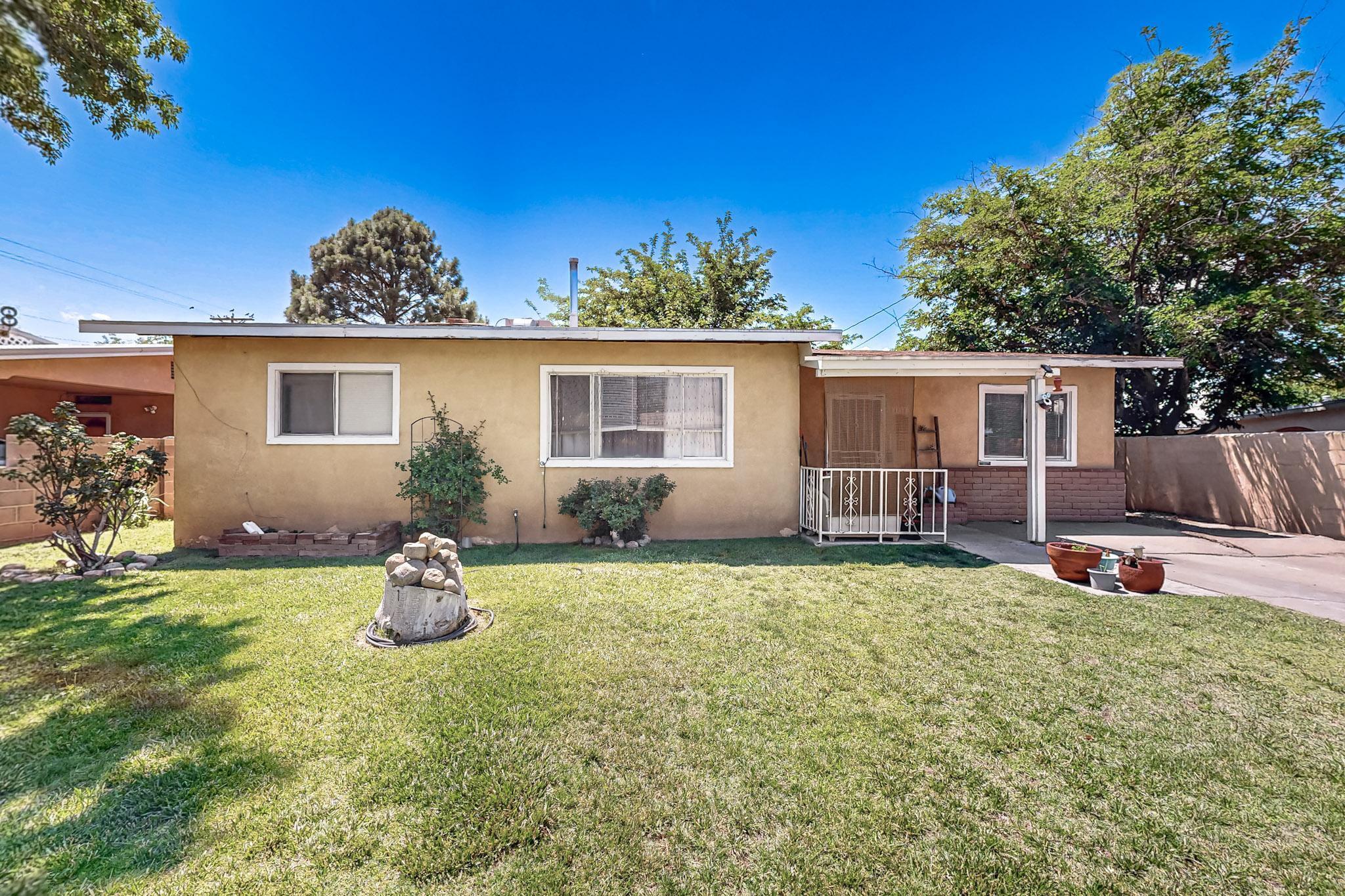 INVESTMENT OPPORTUNITY! This charming 3-bedroom, 2-bath home with an attached casita is nestled in the heart of North Valley, offering both comfort and convenience. Located in a welcoming neighborhood, the home is just steps from a local park and has a high school right behind it, making it ideal for families. The front yard features mature landscaping, while the spacious driveway provides ample parking. Inside, natural light fills the living spaces, creating a warm and inviting atmosphere. The attached casita adds versatility--perfect for guests, a home office, or extra living space. Don't miss this fantastic opportunity to own a home in a prime location! It is on a dead end street and a cul-de-sac. The home is being sold-as-is.