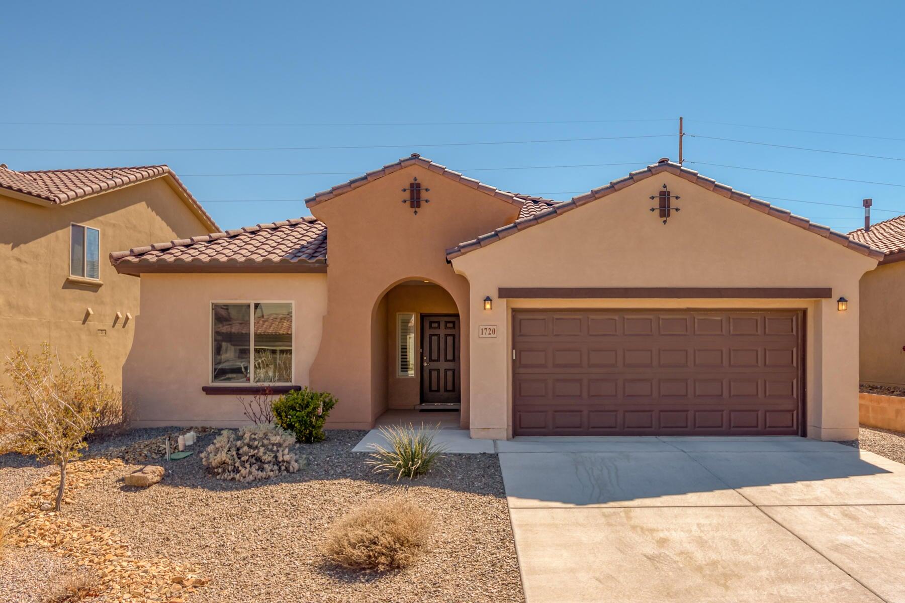 Beautiful well maintained Pulte Emerald floorplan in the beautiful Stormcloud subdivision. Walk through the gallery foyer the open floorplan that will suit anyone's fondest desire, adorned with new laminate flooring throughout the main area, tile throughout the wet areas of the house. The kitchen is equipped with all STAINLESS STEEL APPLIANCES, Steel APPLIANCES, Granite countertops and tiered cabinets with crown molding makes this kitchen a notch above the rest. Living is equipped PLANTATION SHUTTERS are custom built and installed throughout the main areas. Master Bedroom is vary spacious with the upgraded bay windows, not to mention the size of master closet. The back yard is fully landscaped (with drip sys).