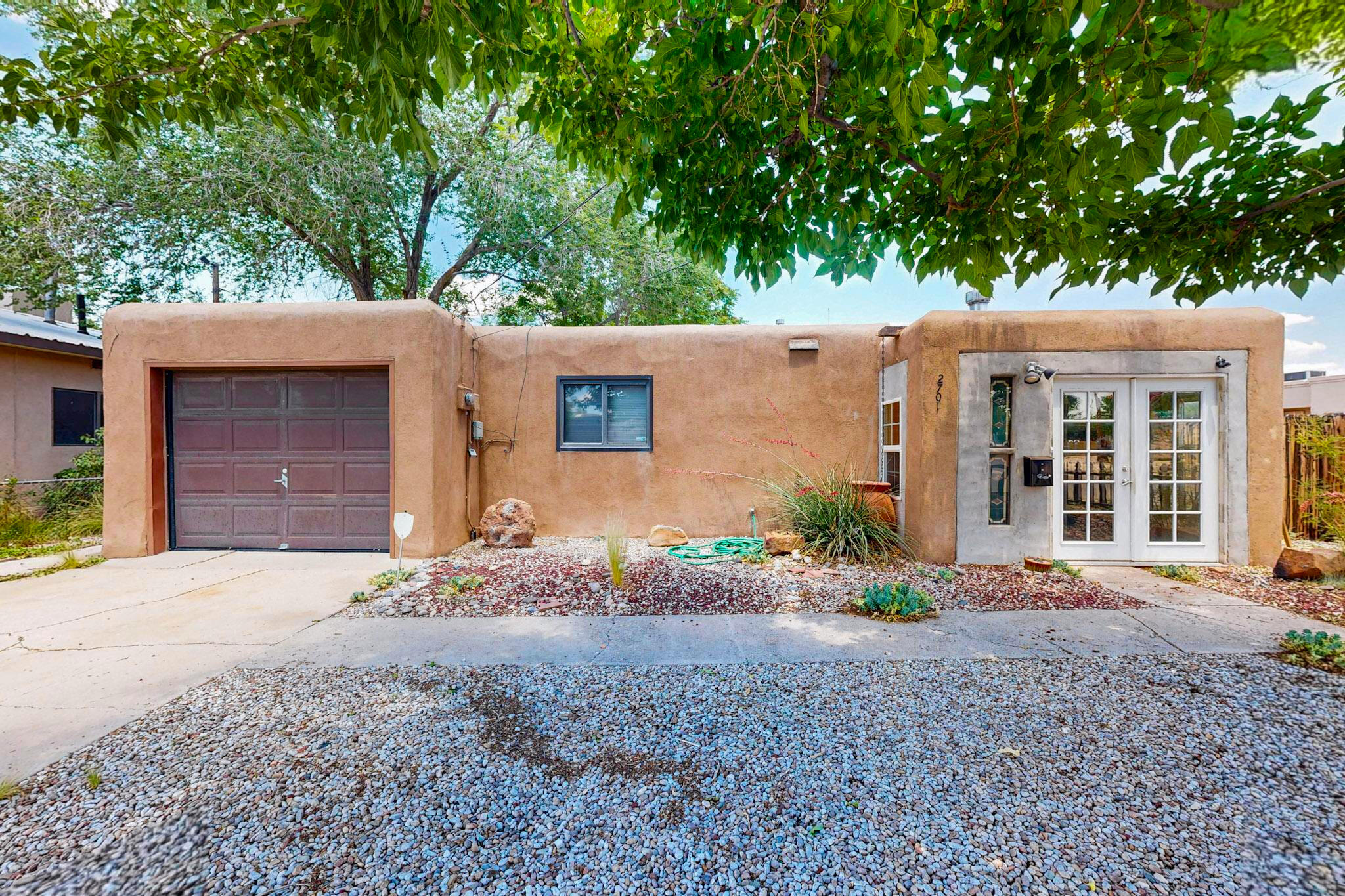 This spacious home offers incredible potential and charm. Featuring 4 bedrooms, 1.5 bathrooms, a dedicated office/studio, and a bonus sunroom with an in-ground pond, this property delivers unique character rarely found in this price range.Enjoy a fenced backyard ideal for relaxing or entertaining, plus an oversized 1-car garage with ample workspace. Directly across from Reginald Chavez Elementary School and minutes away from Old Town, parks, and local dining.The home does need cosmetic updates like carpet and interior paint, but with the right touch, it has the potential to become something truly special. Roof recently serviced.Seller is offering a $5,000 credit with a full-price or higher offer--use it for closing costs or improvements to make this home your own.