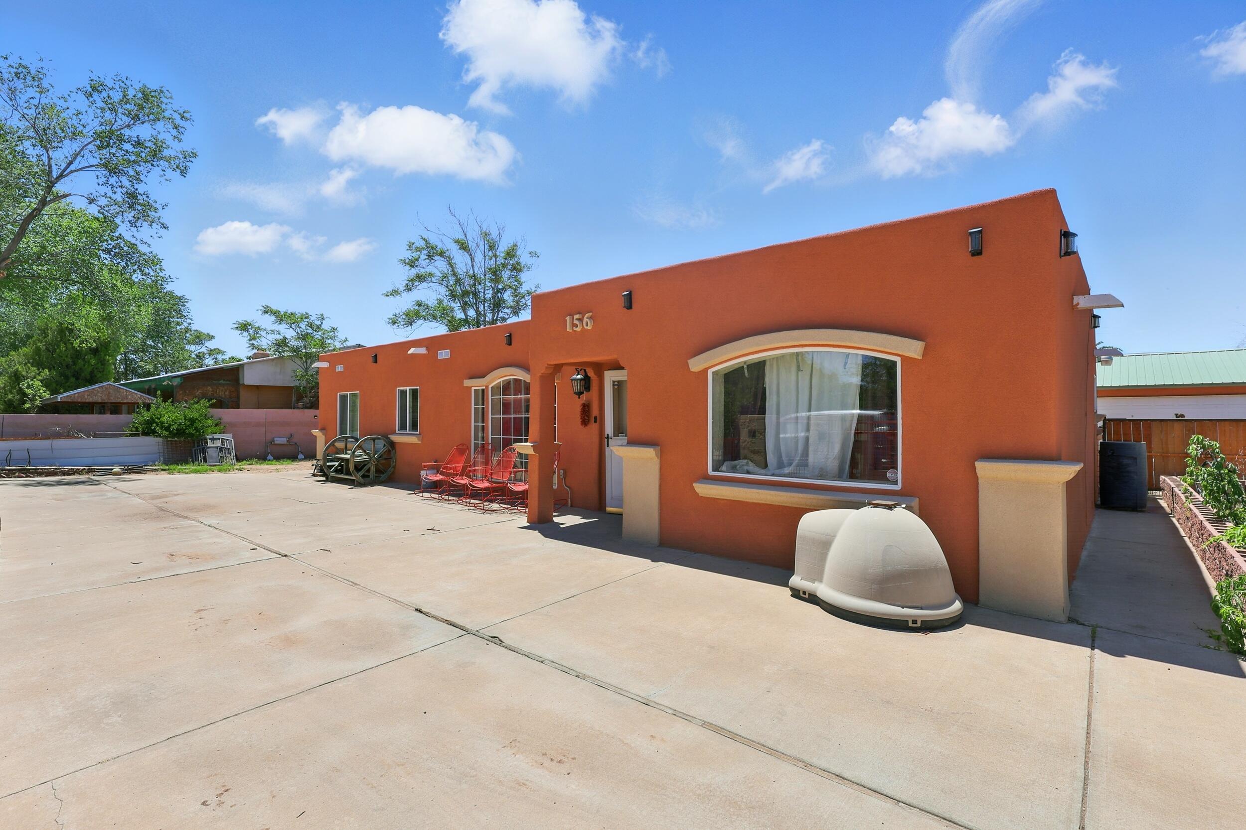 Well-maintained property featuring an additional spacious 1,200 sq ft casita with a 650 sq ft garage. The main home offers a Master suite addition, granite countertops throughout, and custom wood cabinetry. Enjoy year-round comfort with new (2023) refrigerated air. Fully electric with solar--no gas utilities. Recent upgrades include a TPO roof (2021) and fresh stucco (2023). A turnkey setup ideal for multi-generational living or rental potential.
